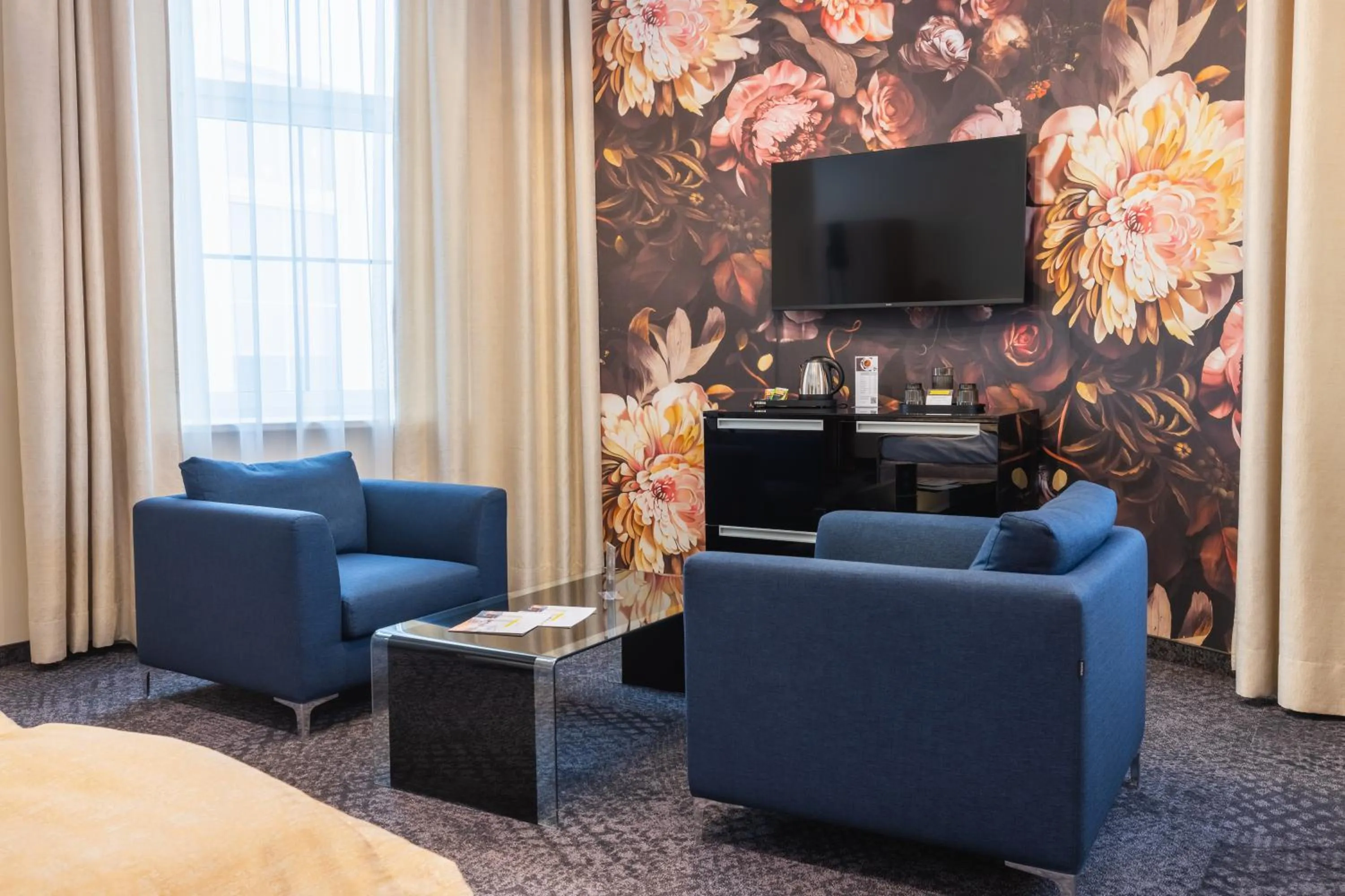 Seating area in HiLight Suites Hotel