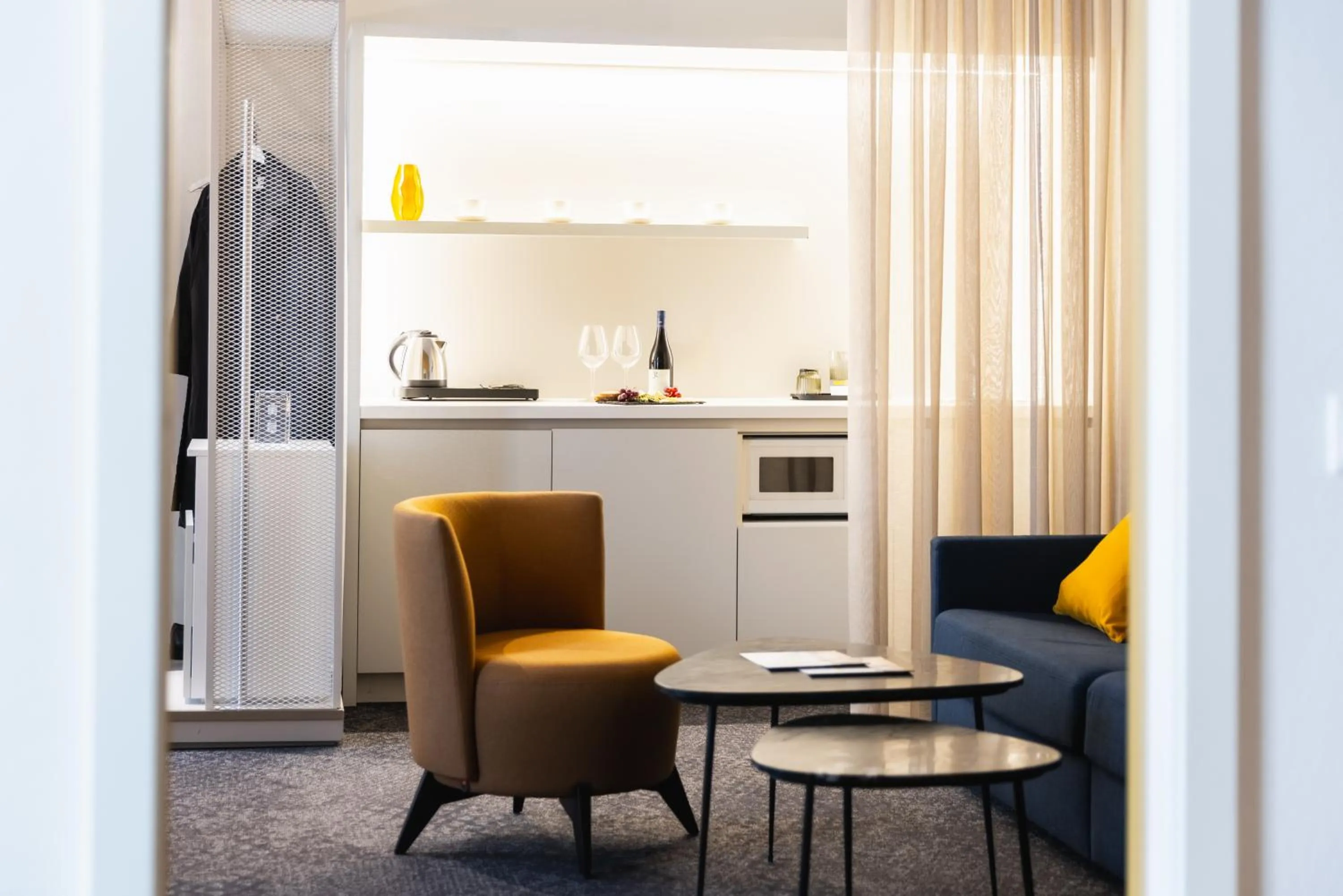 kitchen in HiLight Suites Hotel