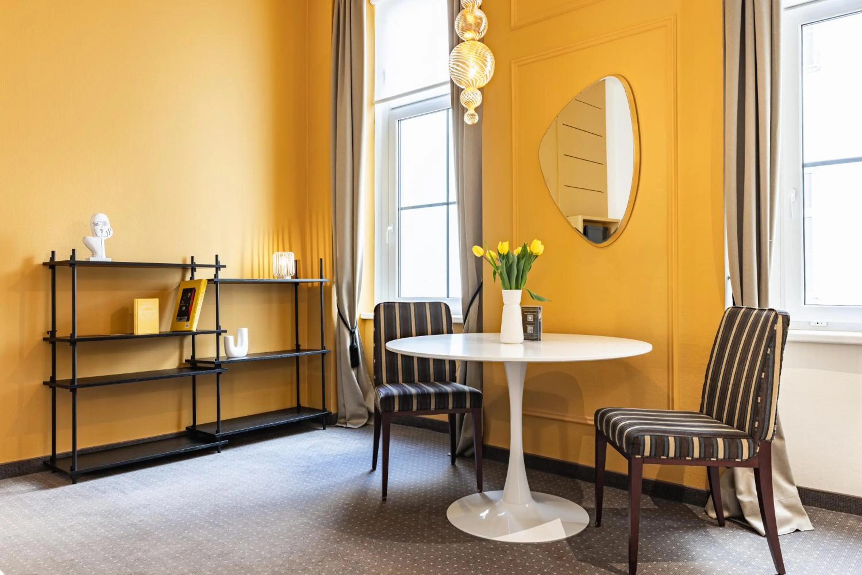 Living room in HiLight Suites Hotel