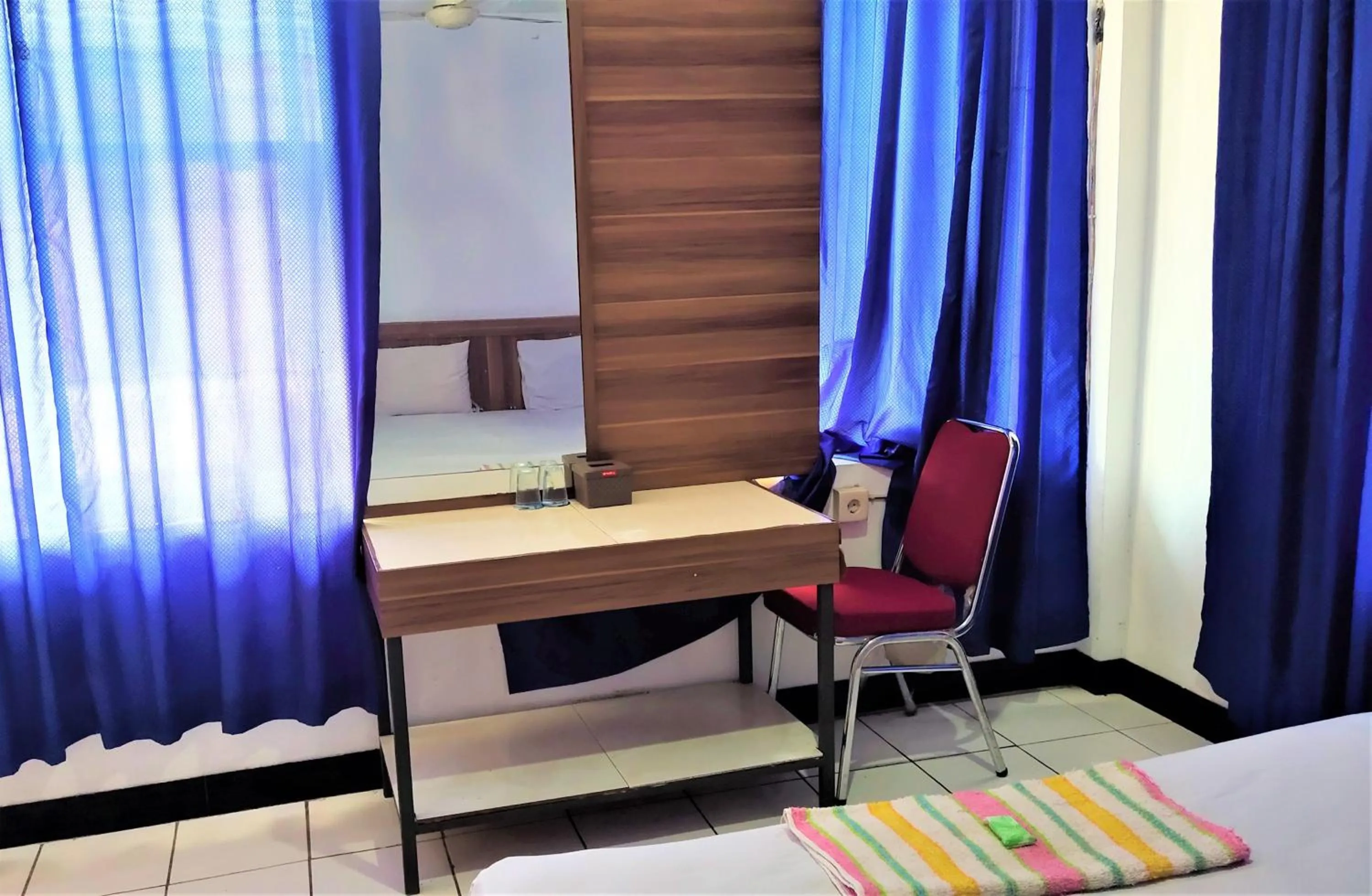 TV and multimedia in De' Premium Hotel Musi Raya