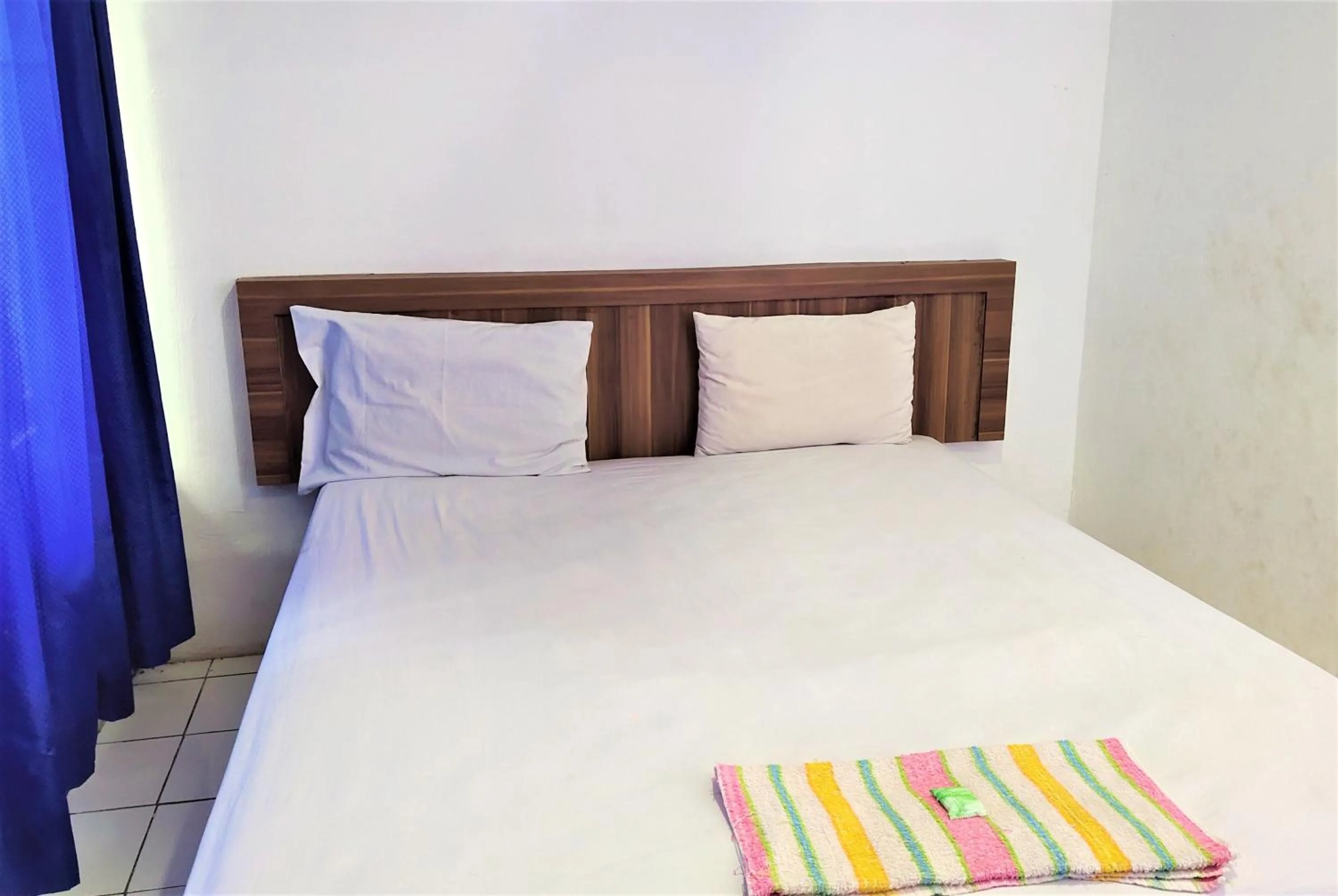 Bedroom in De' Premium Hotel Musi Raya