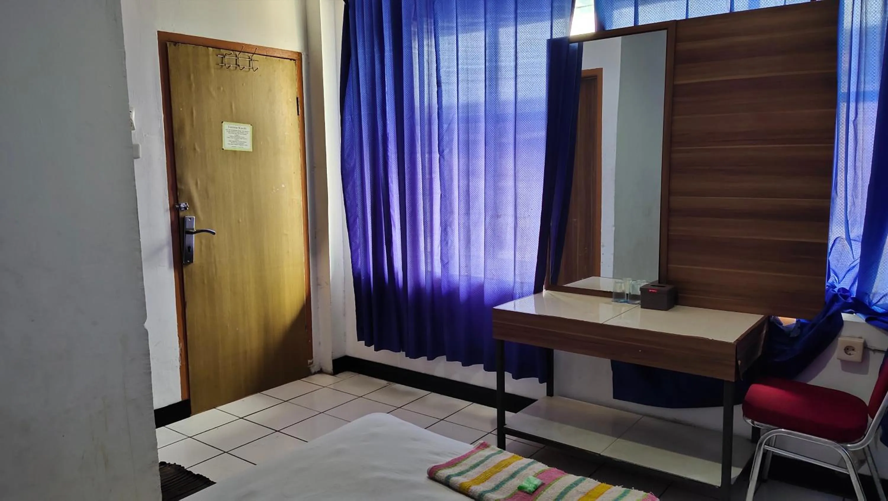 Bedroom in De' Premium Hotel Musi Raya