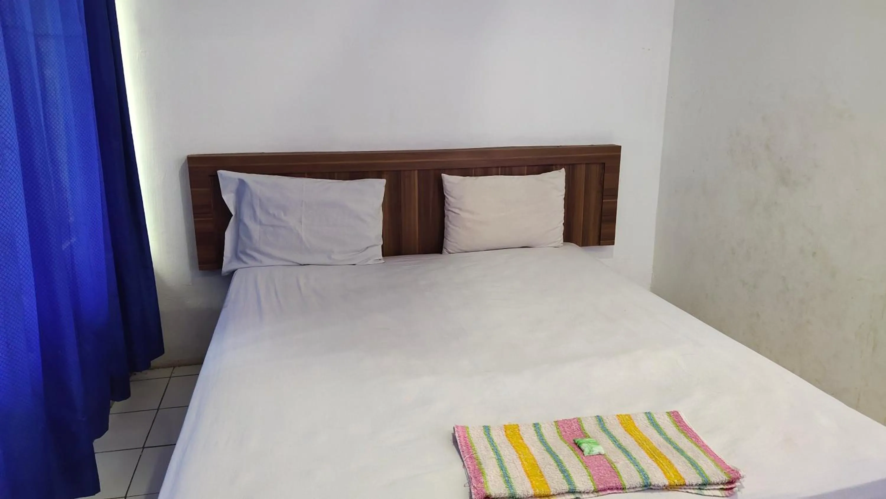 Bedroom in De' Premium Hotel Musi Raya