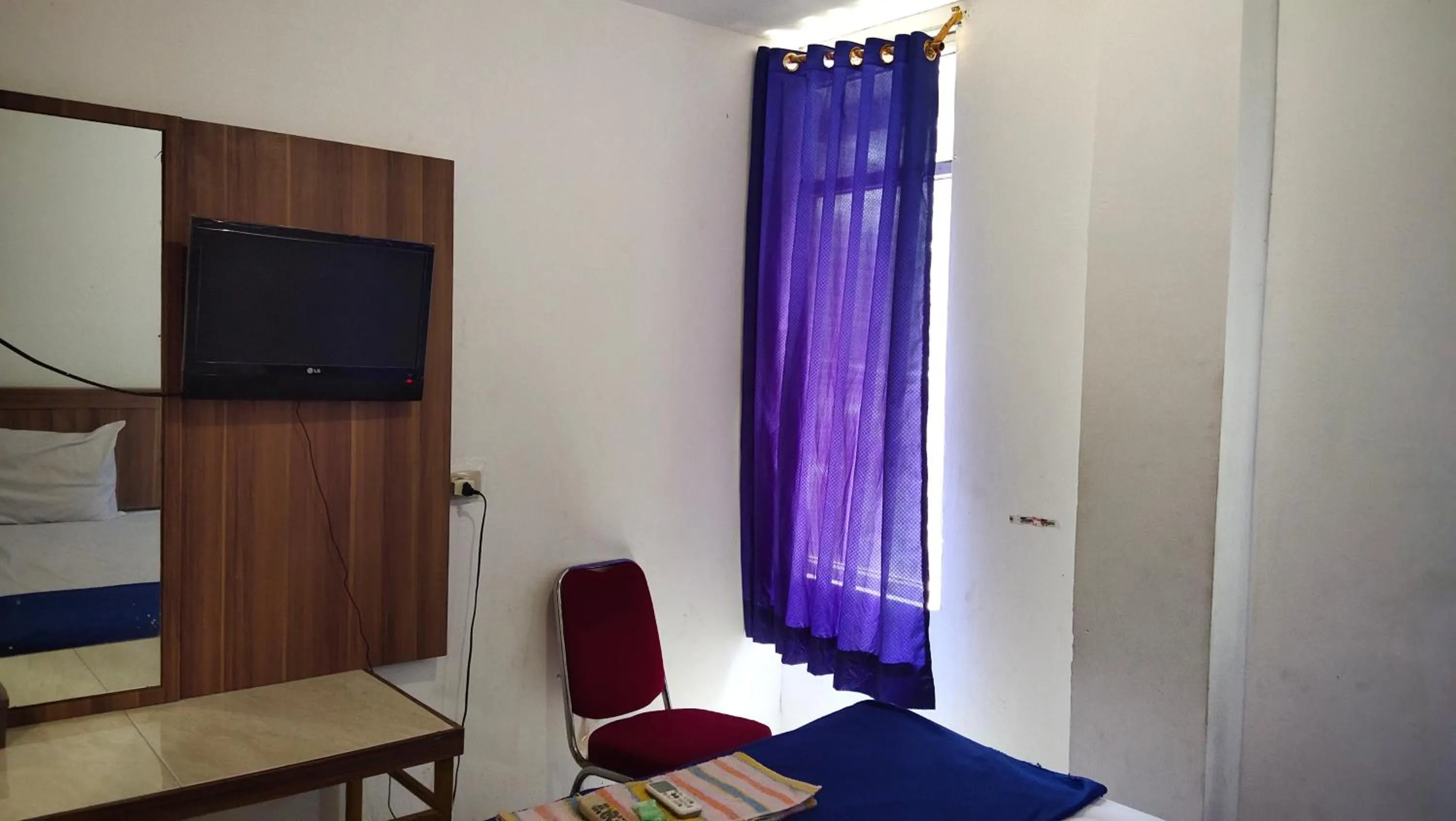 TV and multimedia in De' Premium Hotel Musi Raya