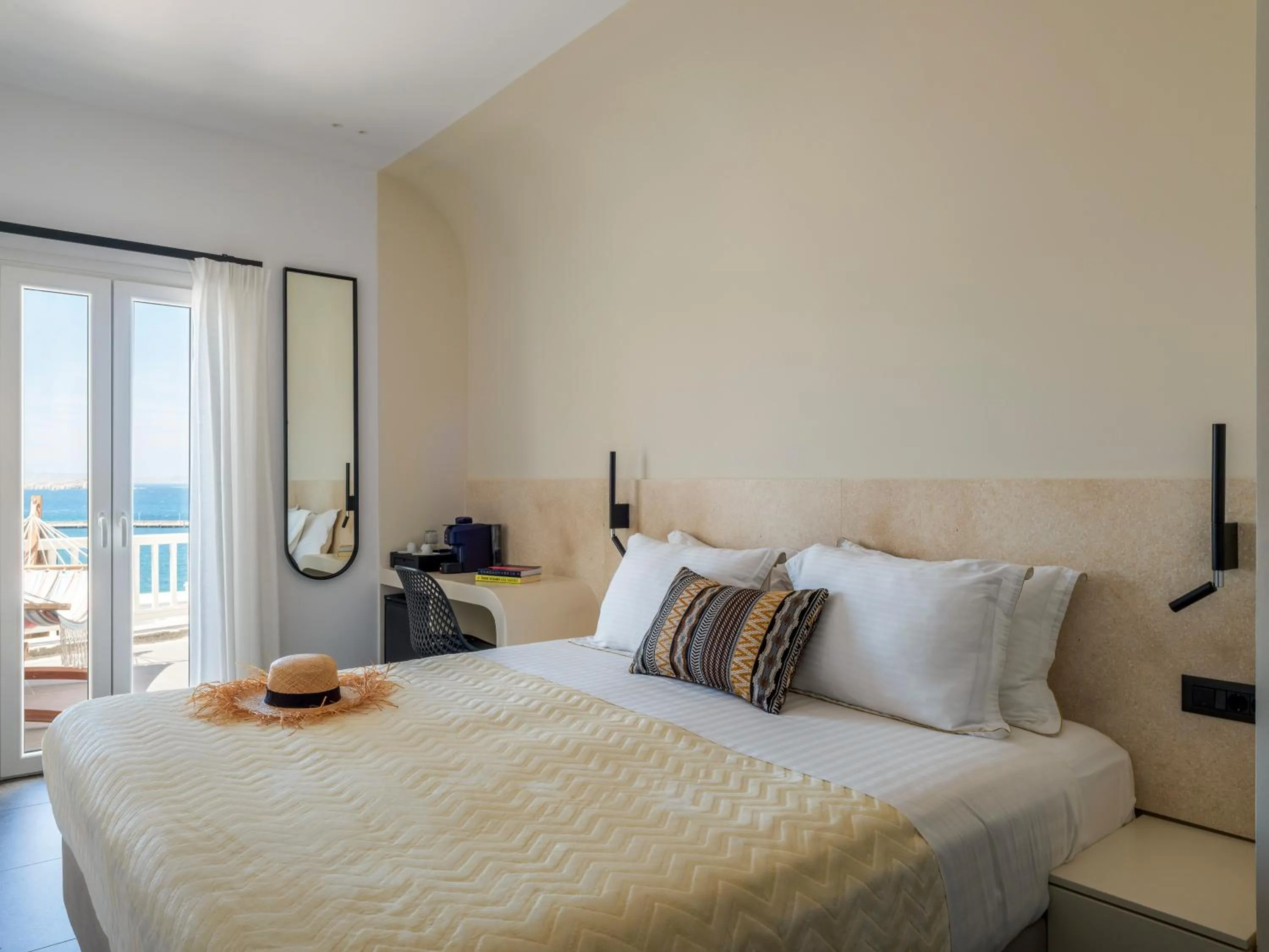 Bed in Yalos Hotel Sunset view Mykonos town private rooms