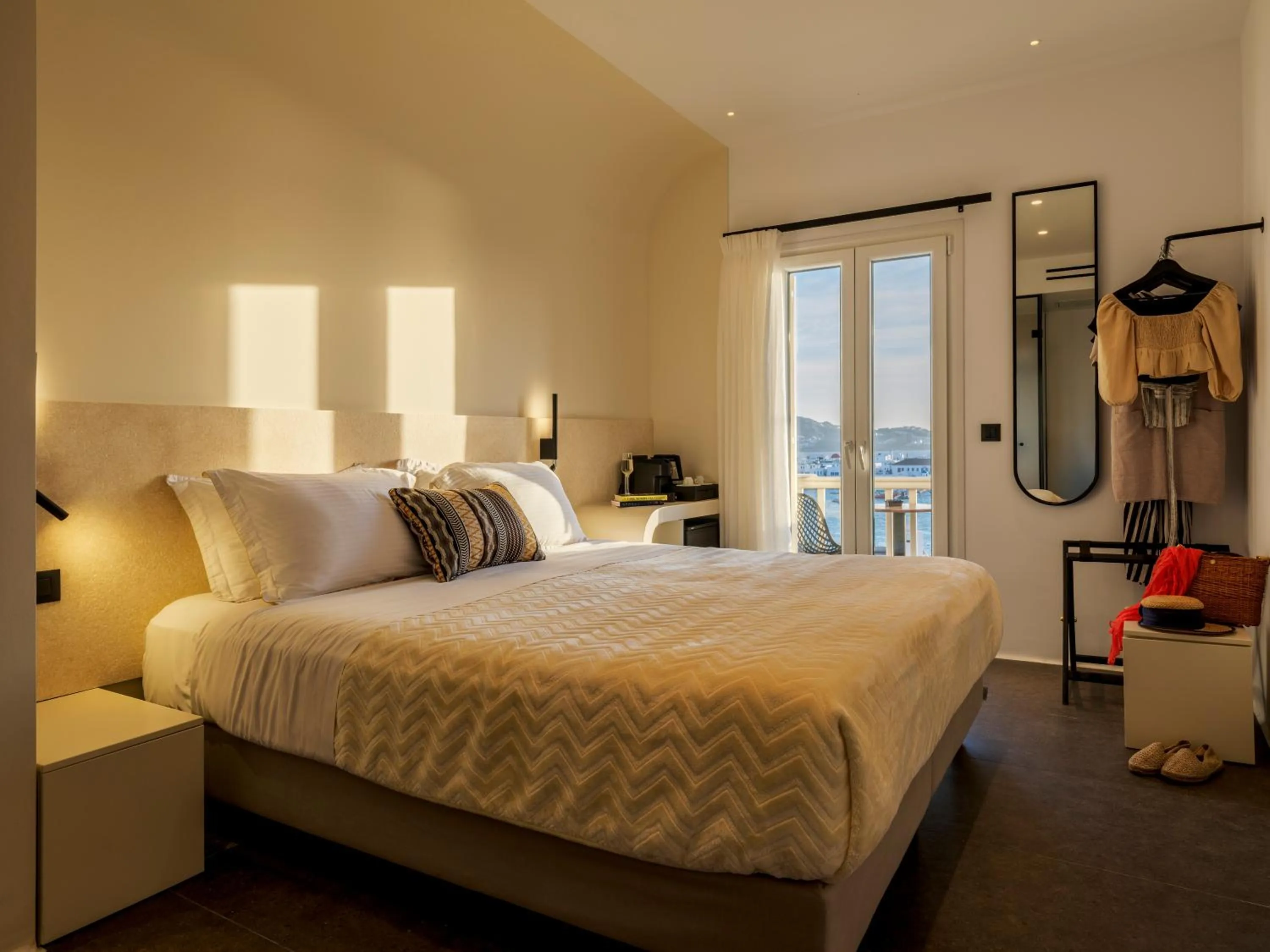 Bed in Yalos Hotel Sunset view Mykonos town private rooms