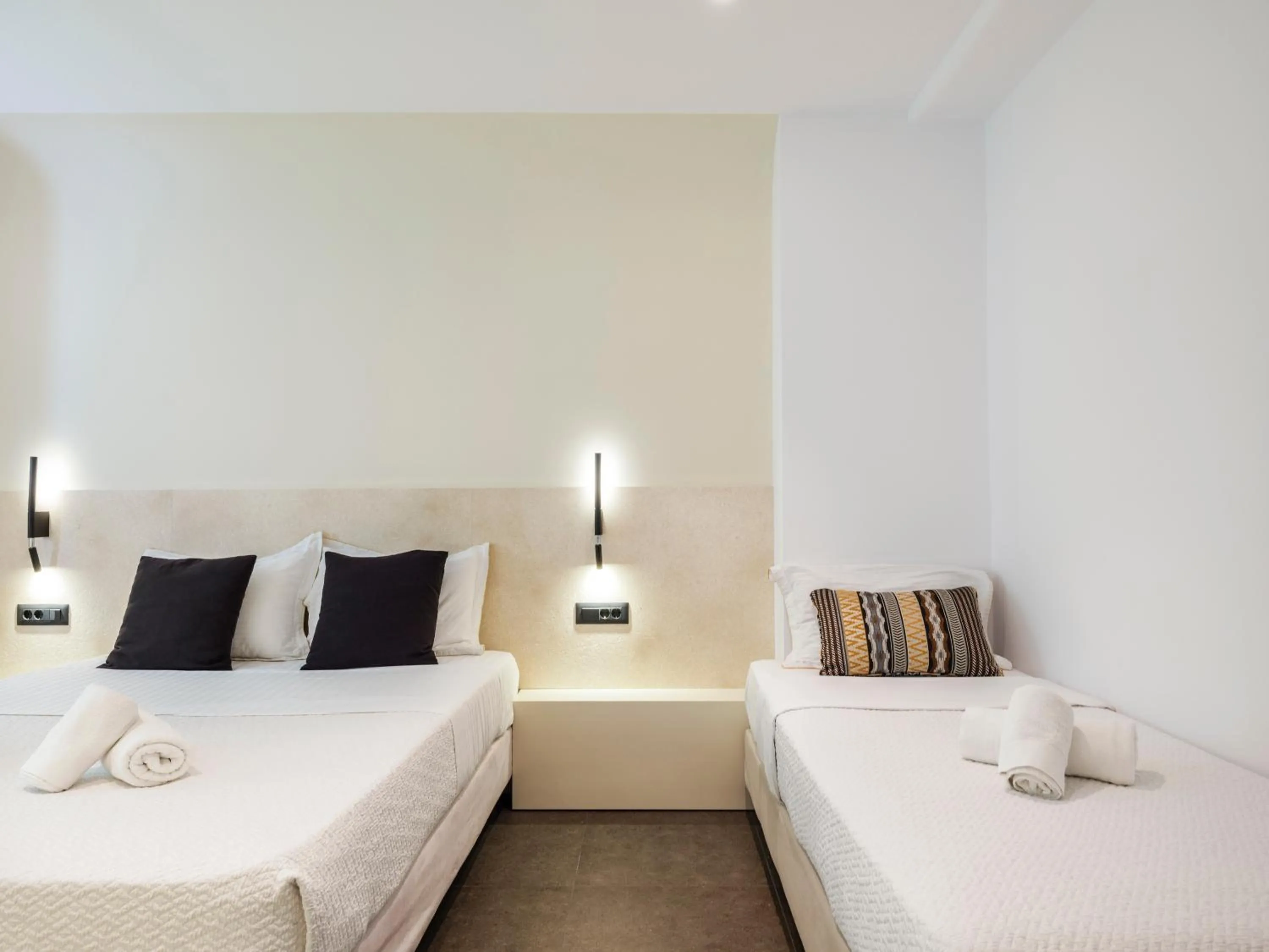 Bed in Yalos Hotel Sunset view Mykonos town private rooms