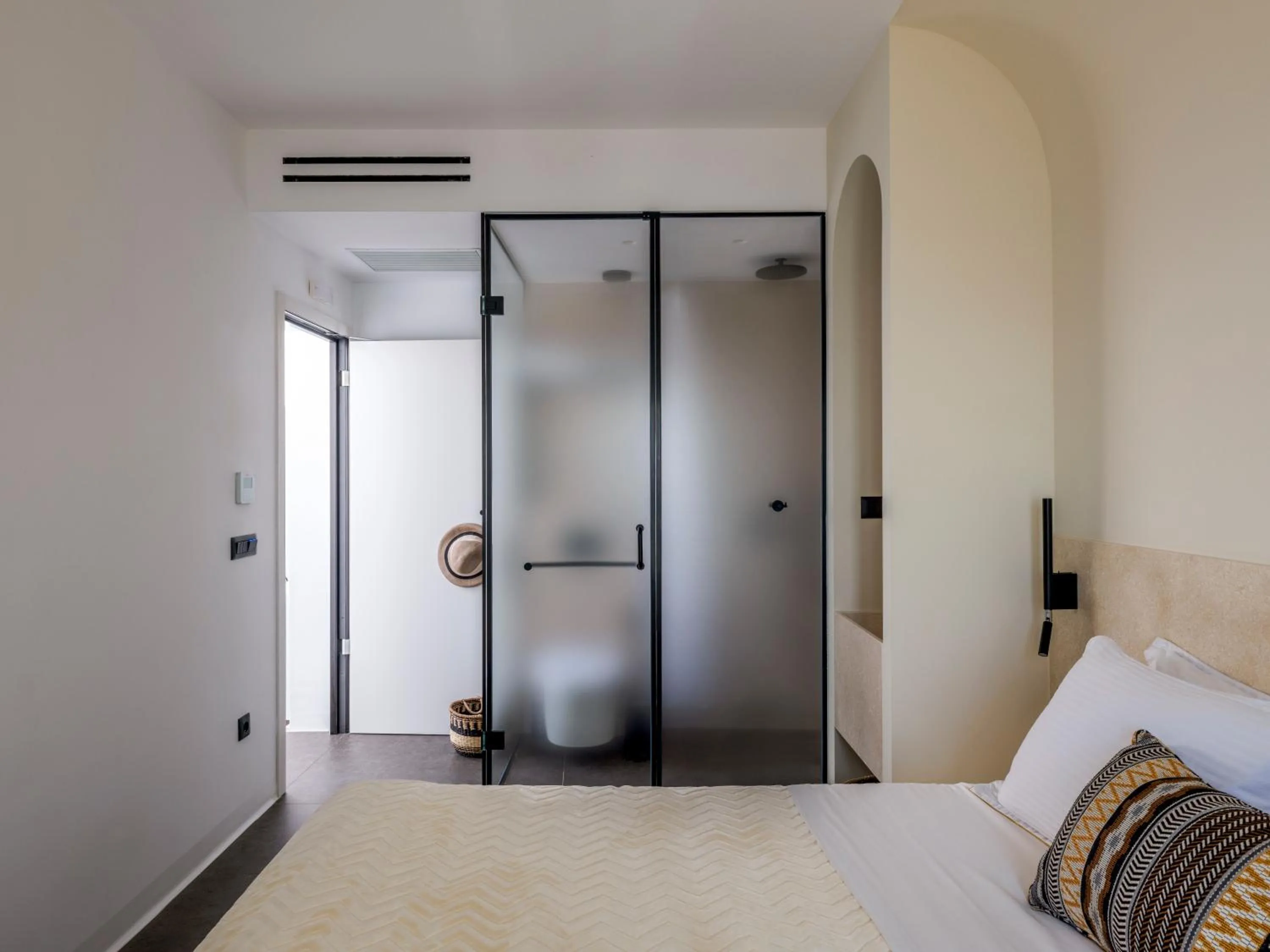 Bed in Yalos Hotel Sunset view Mykonos town private rooms