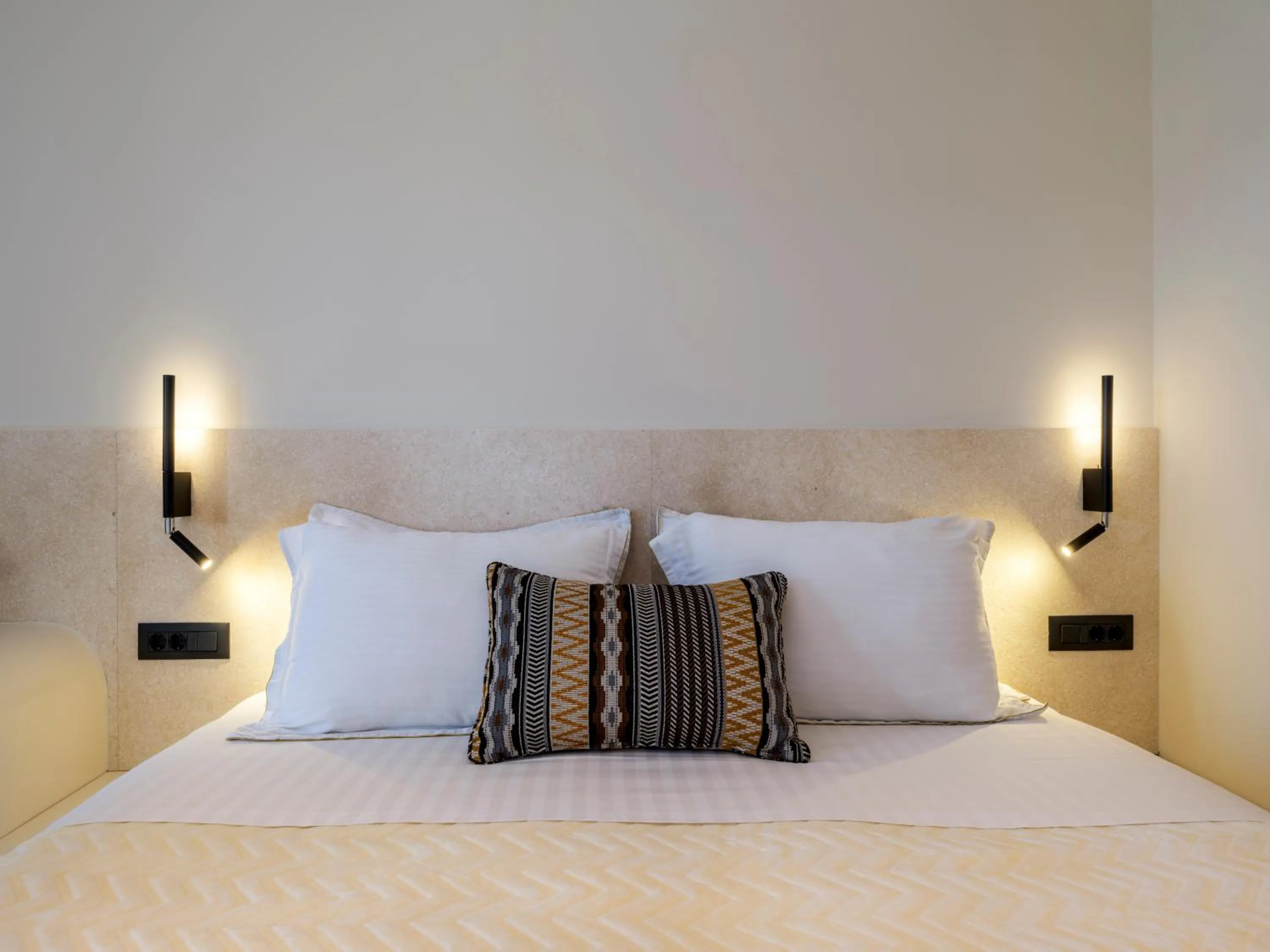 Bed in Yalos Hotel Sunset view Mykonos town private rooms