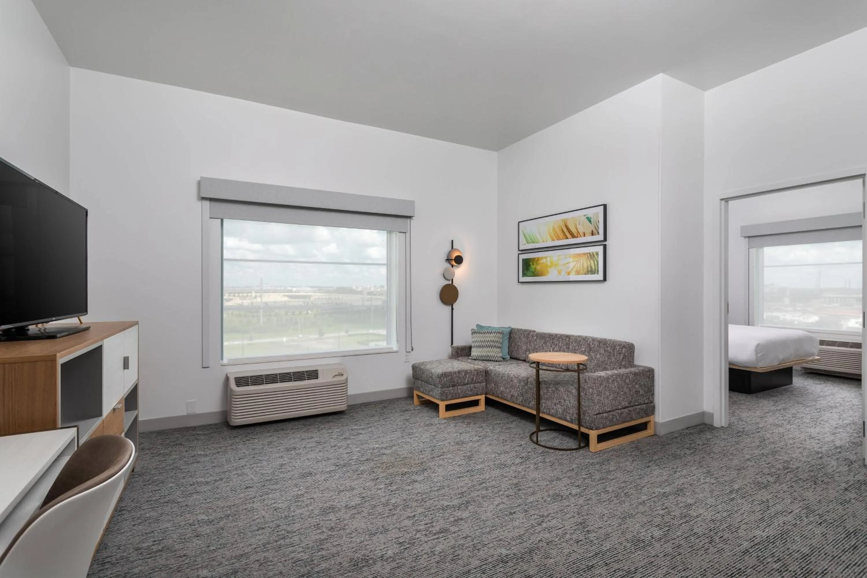 Living room, Bed in TownePlace Suites By Marriott Orlando Southwest Near Universal