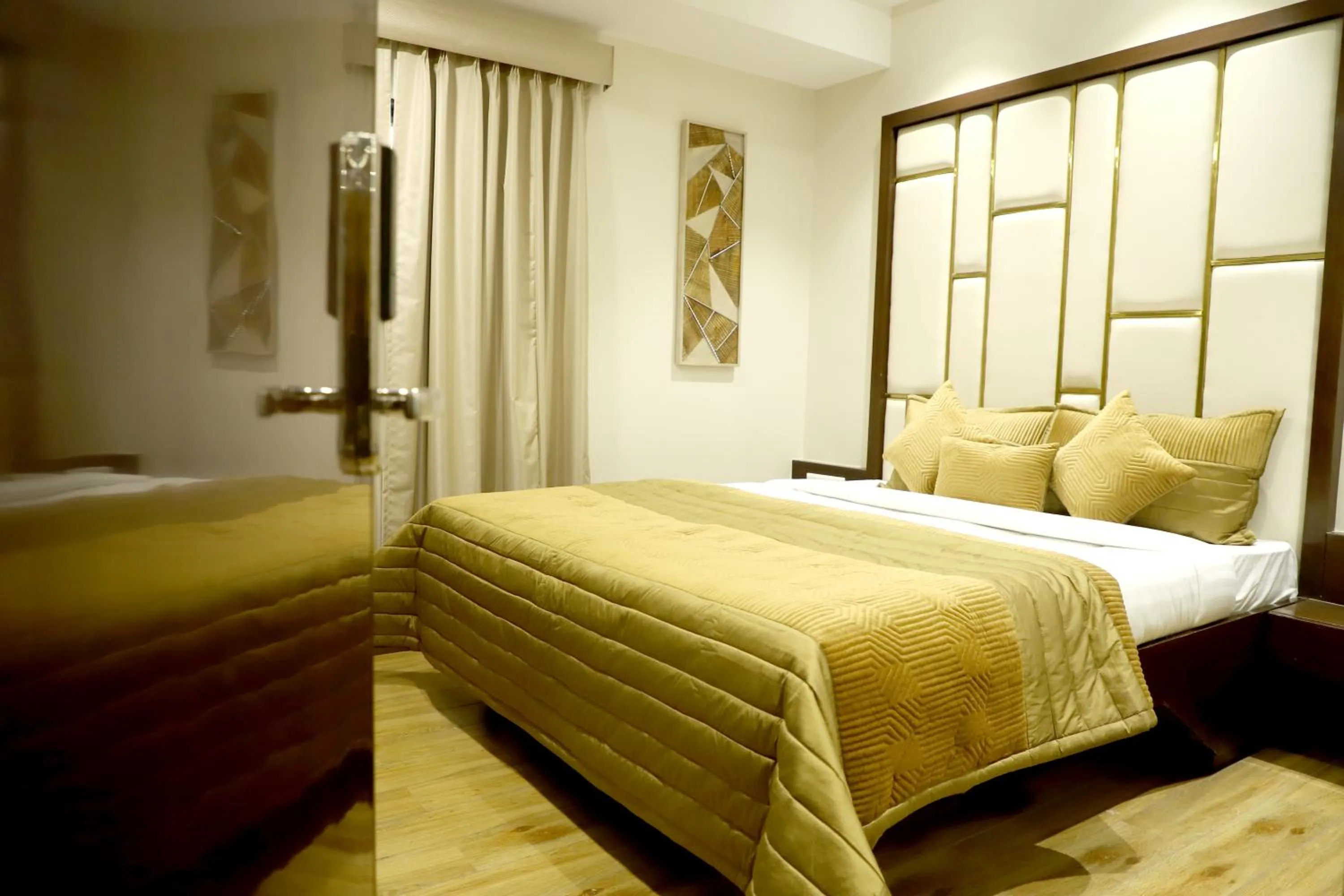 Bed in Hotel Grand Girdhar