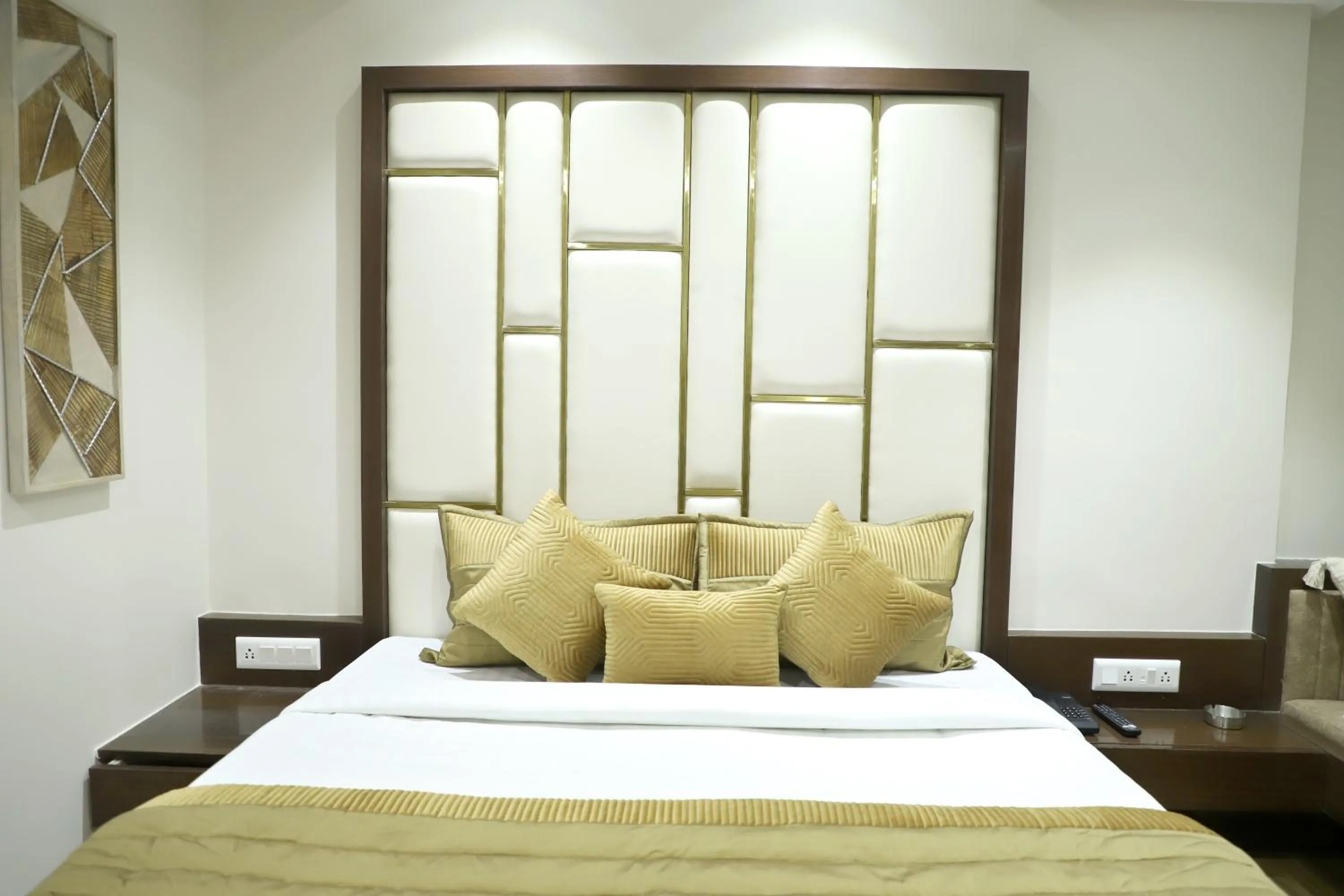 Bed in Hotel Grand Girdhar