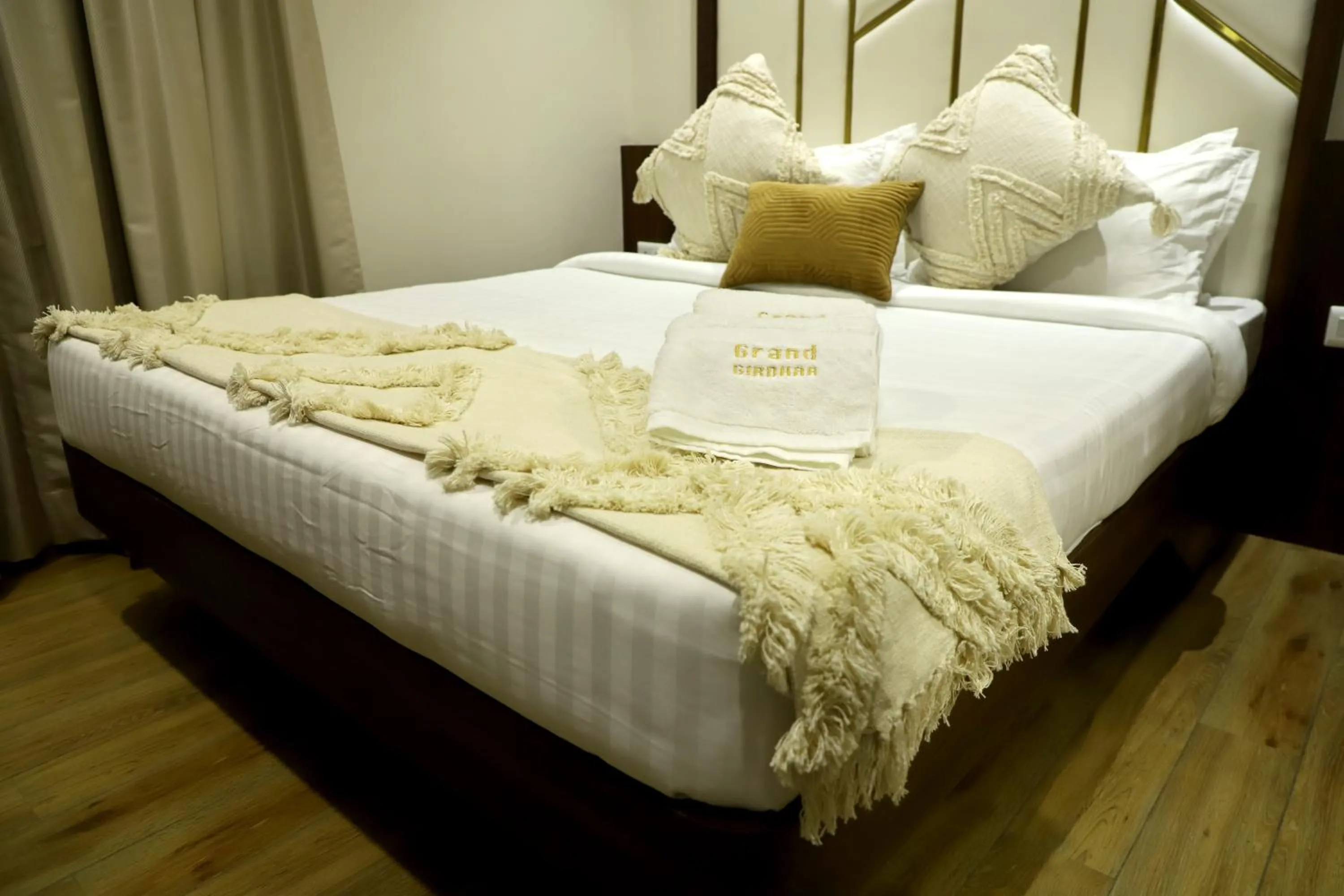 Bed in Hotel Grand Girdhar