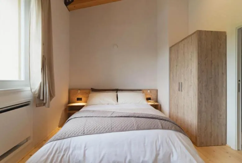 Bed in Tenuta Grimaldi Wine Resort