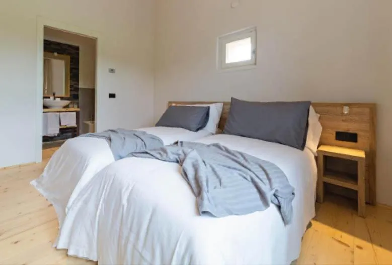 Bed in Tenuta Grimaldi Wine Resort