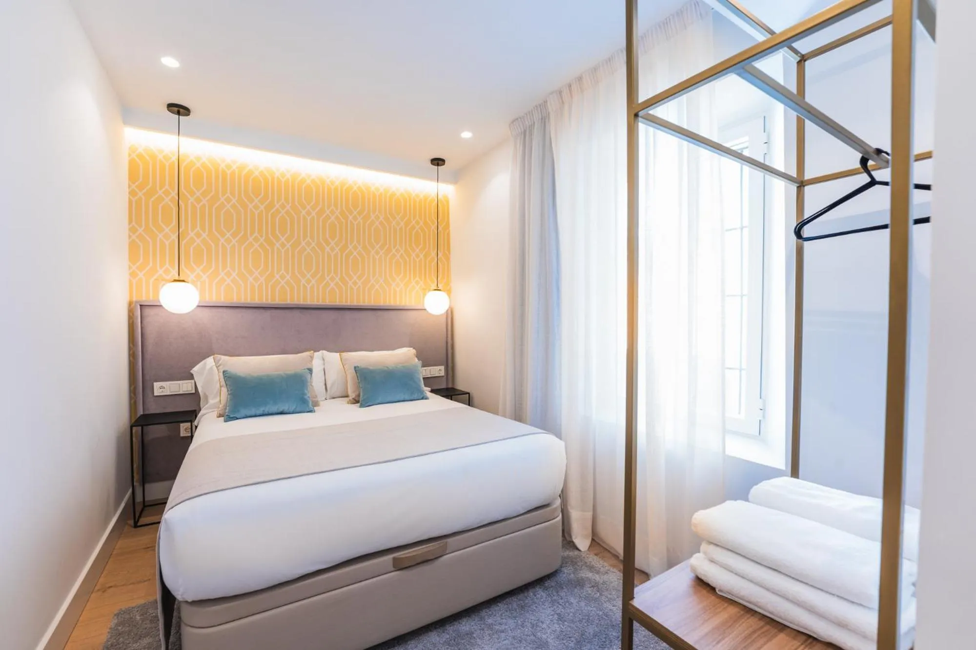 Bed in Debambú Suites