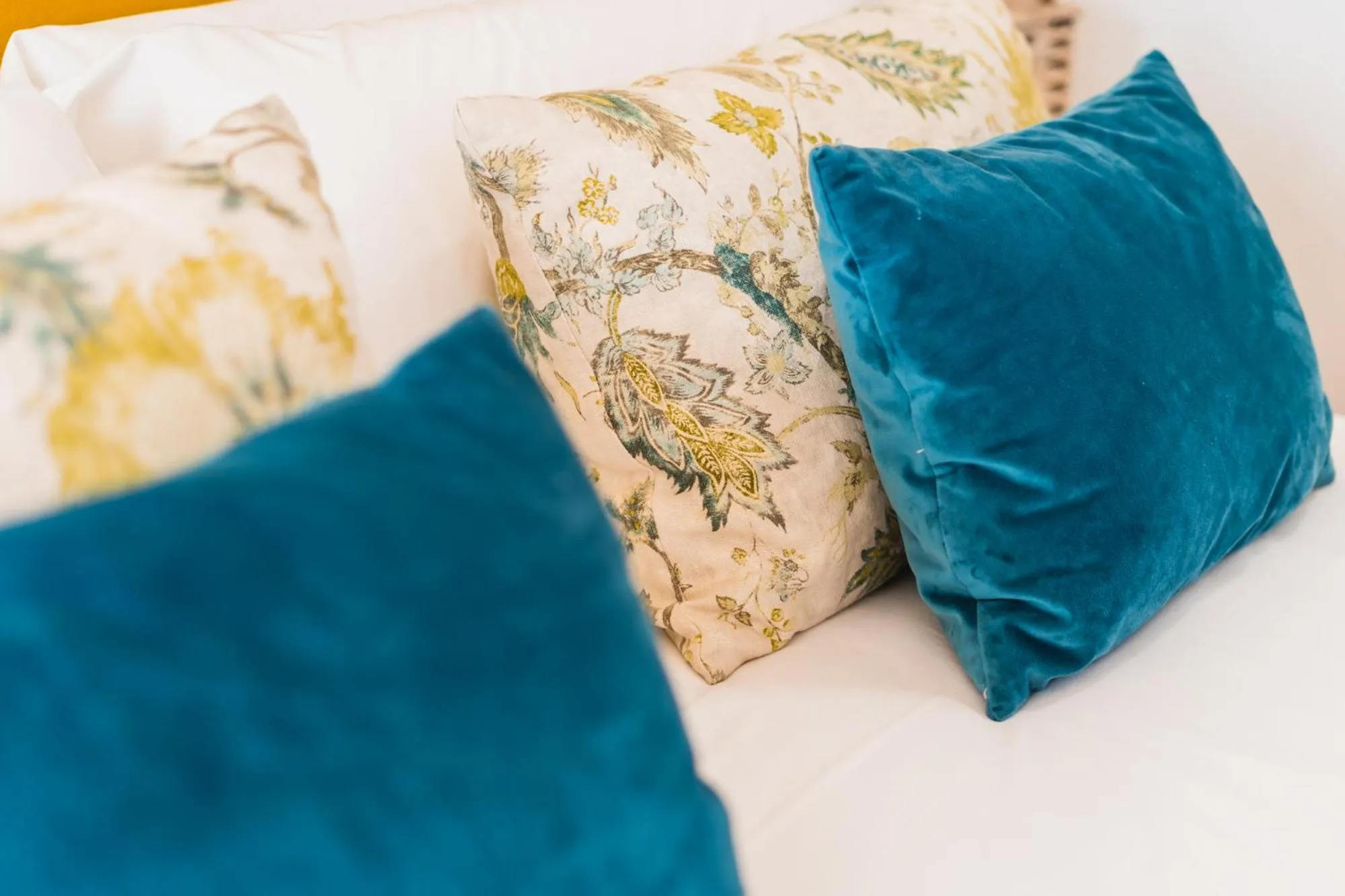 Bed in Debambú Suites