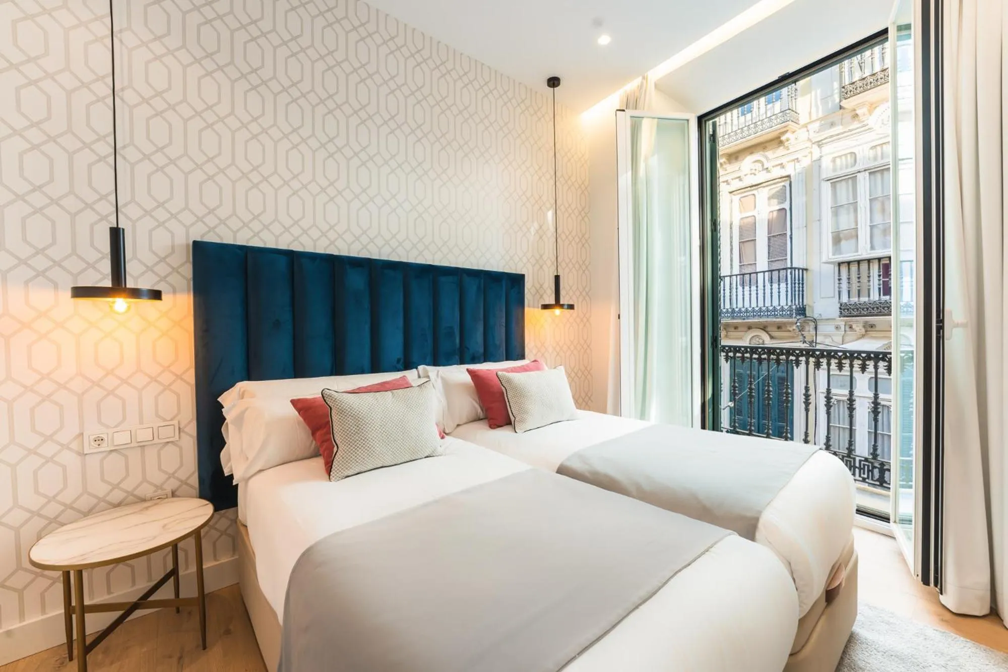 Bed in Debambú Suites