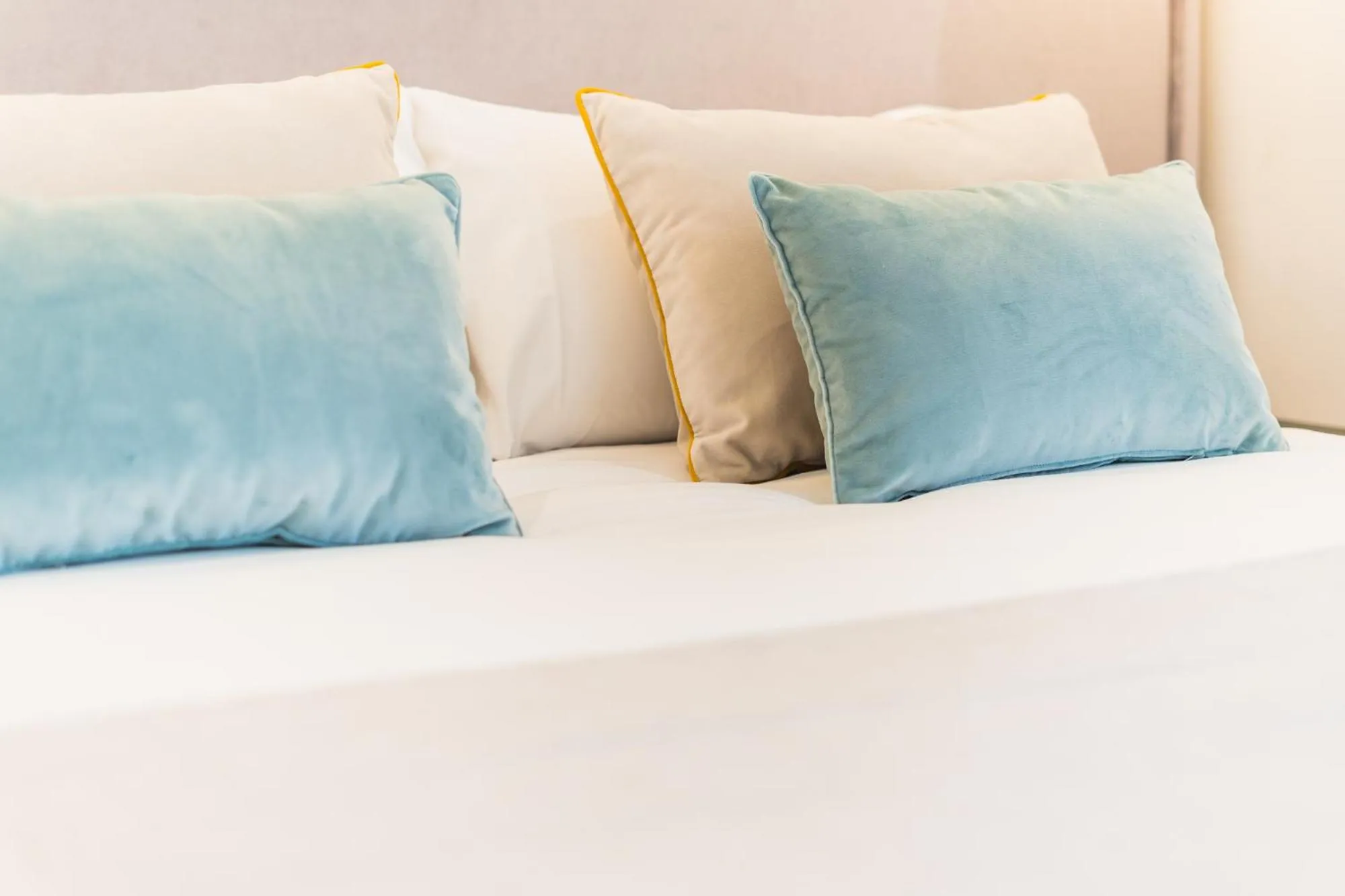 Bed in Debambú Suites