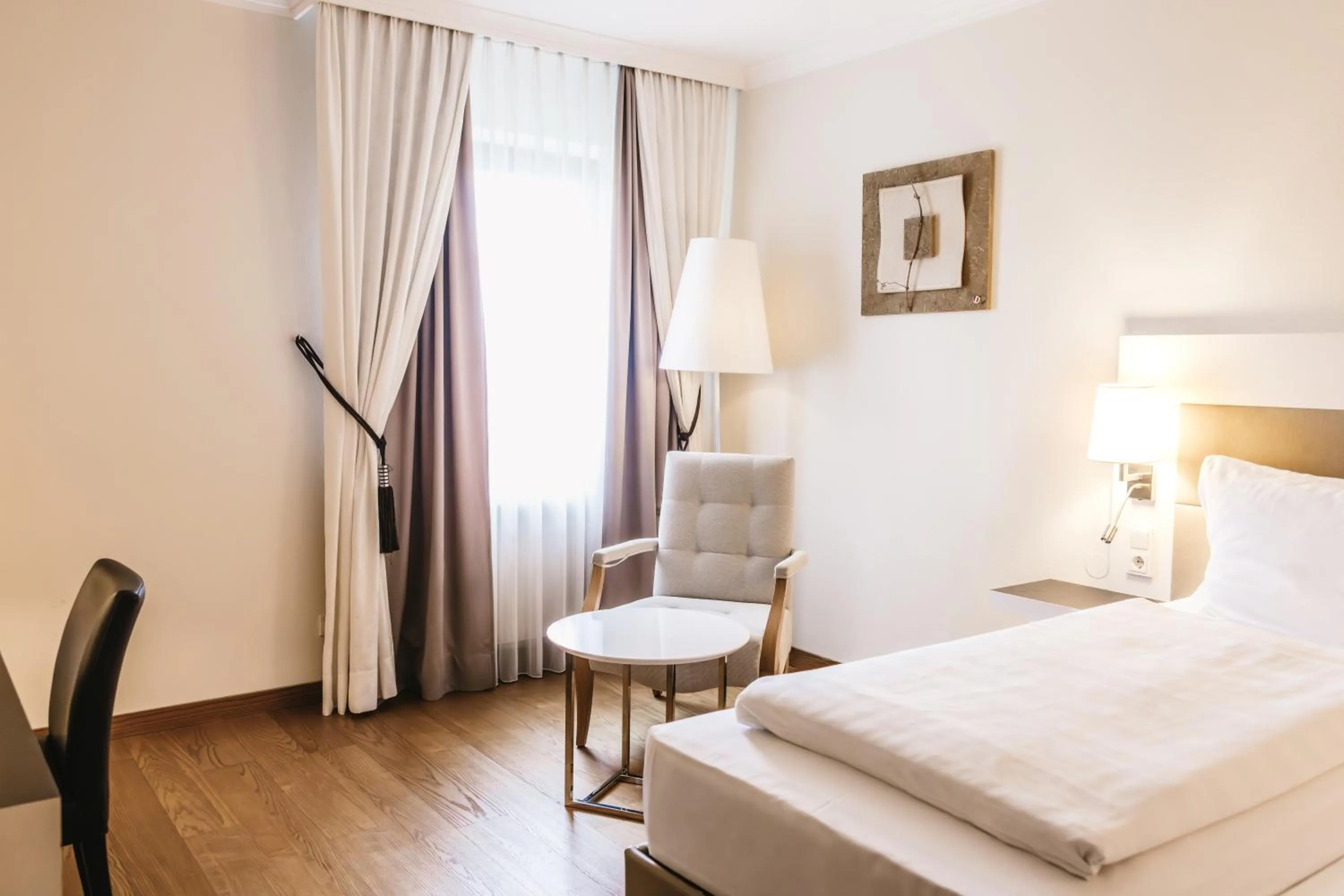 Seating area, Bed in Steigenberger Hotel & Spa Krems