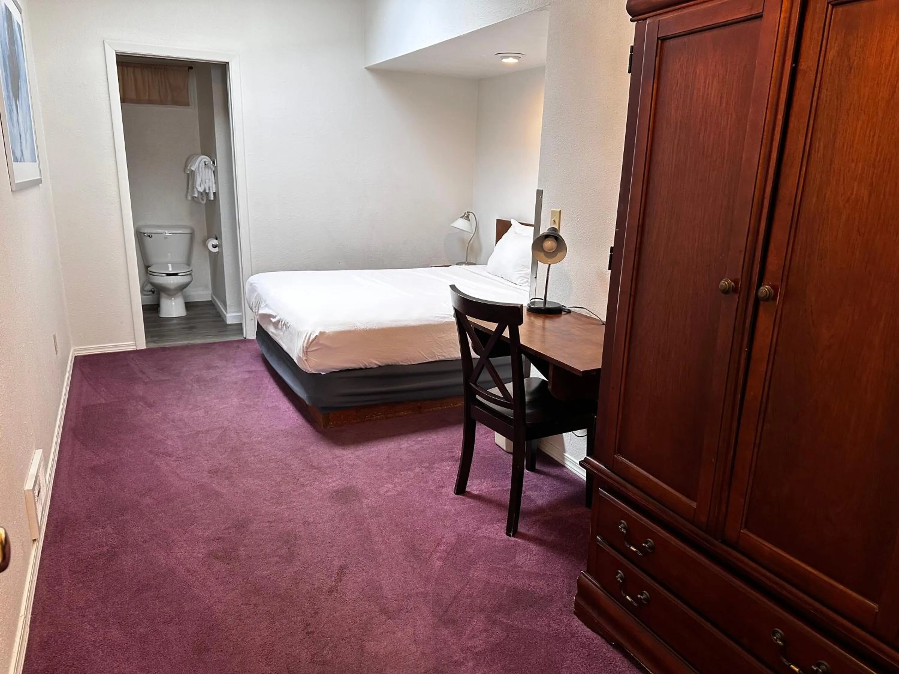 Bed in Seahorse Oceanfront Lodge