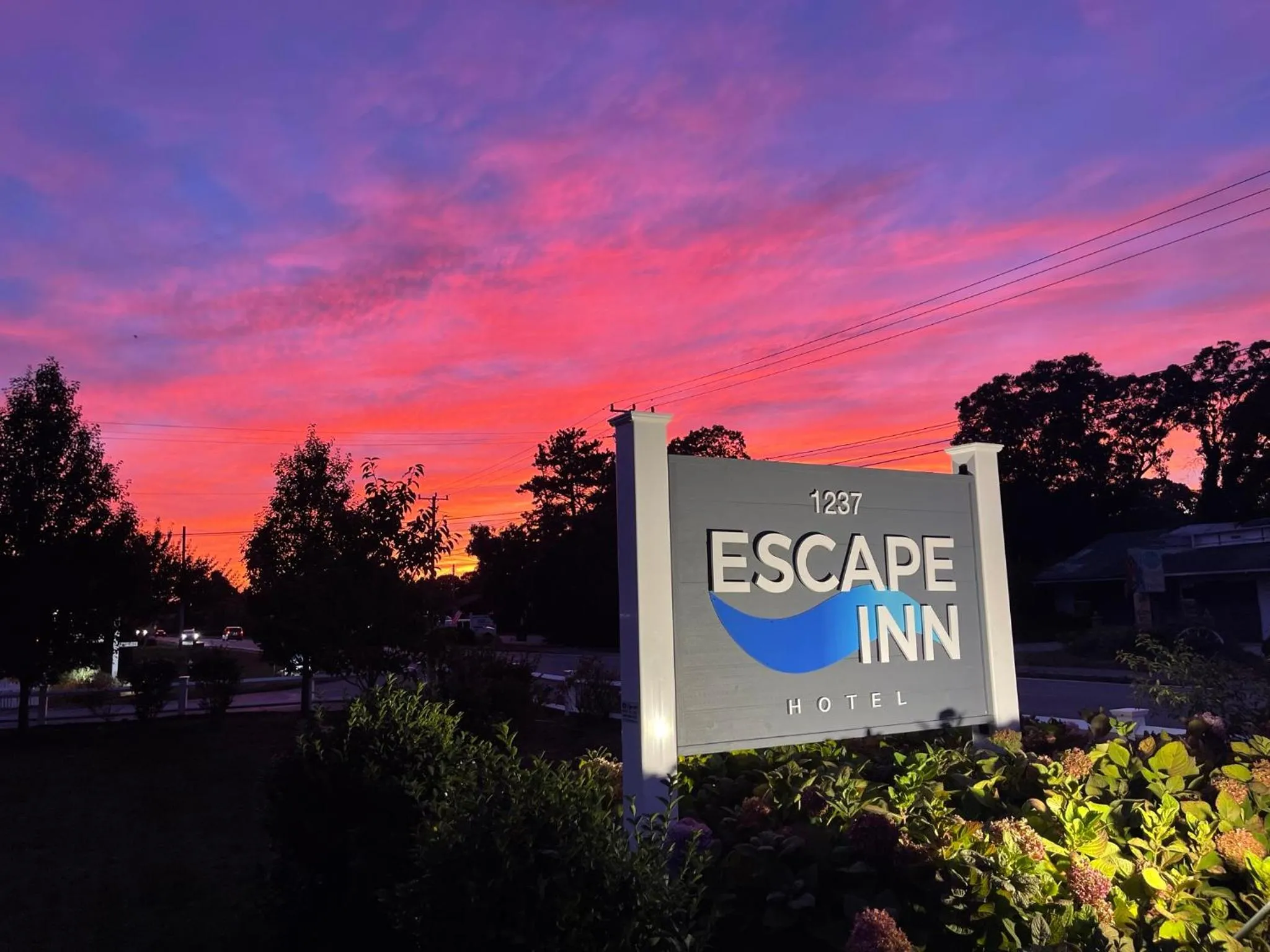 Property logo or sign in The Escape Inn