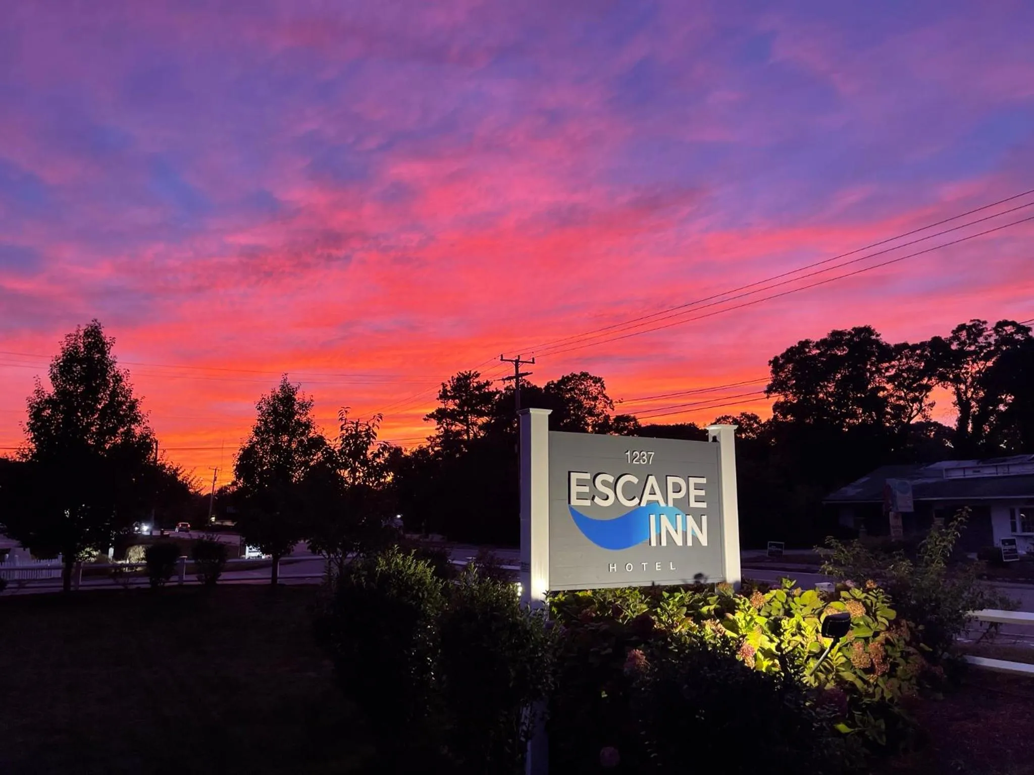 Property logo or sign in The Escape Inn