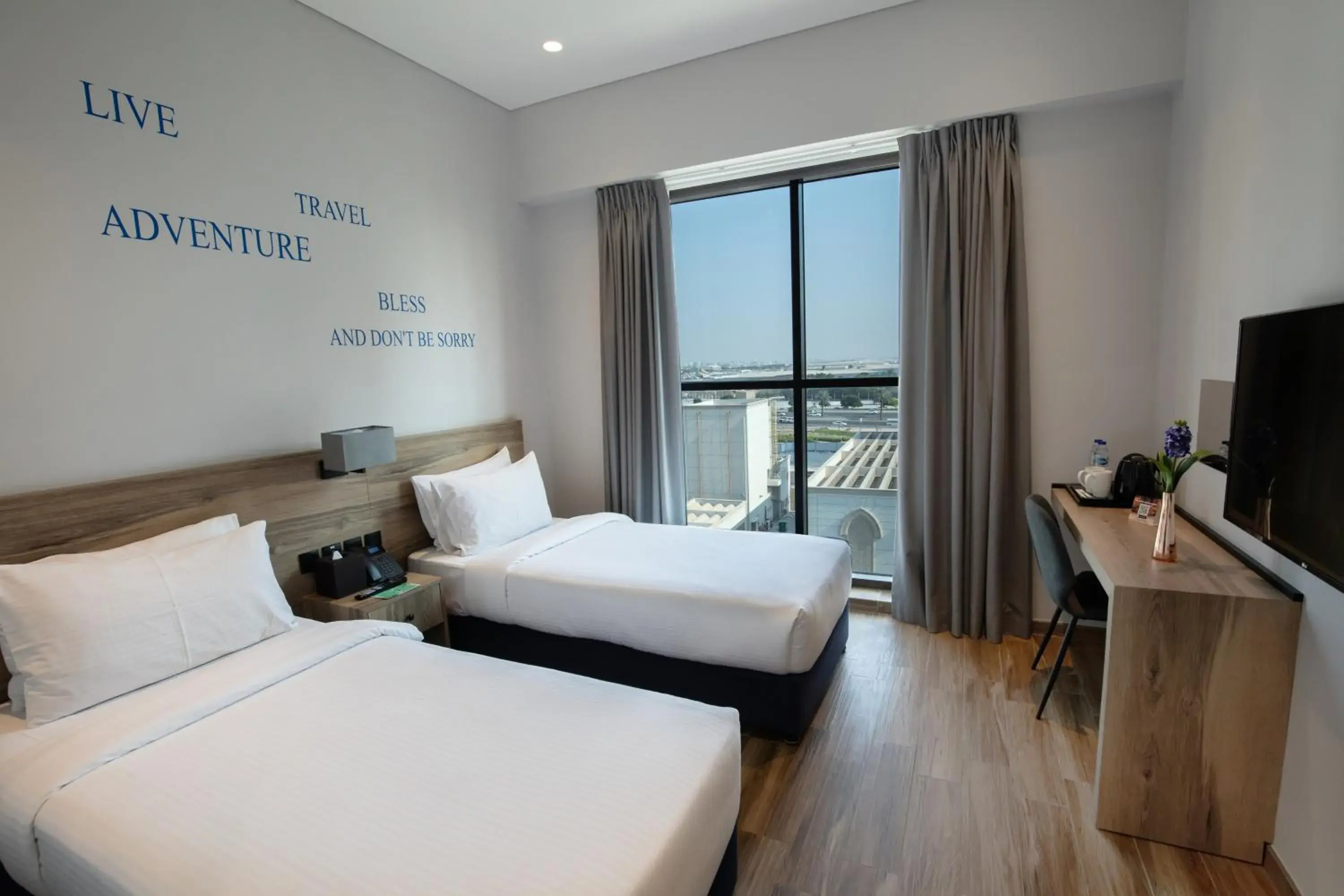 Deluxe Twin Room City View (includes 25% off F&B) in Kingsgate Canal Hotel by Millennium Deluxe Twin Room City View (includes 25% off F&B) in Kingsgate Canal Hotel by Millennium
