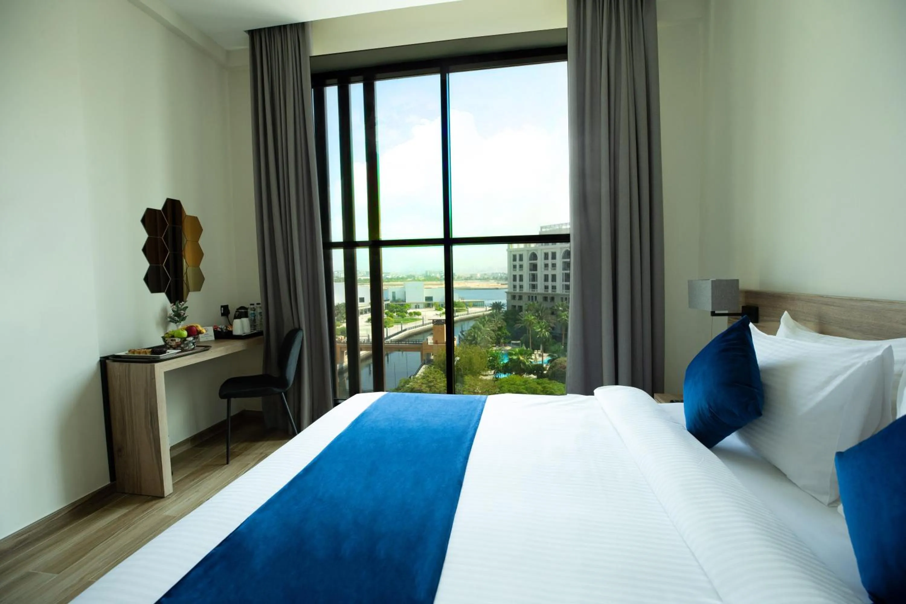View (from property/room), Bed in Grand Kingsgate Jaddaf Waterfront Hotel by Millennium