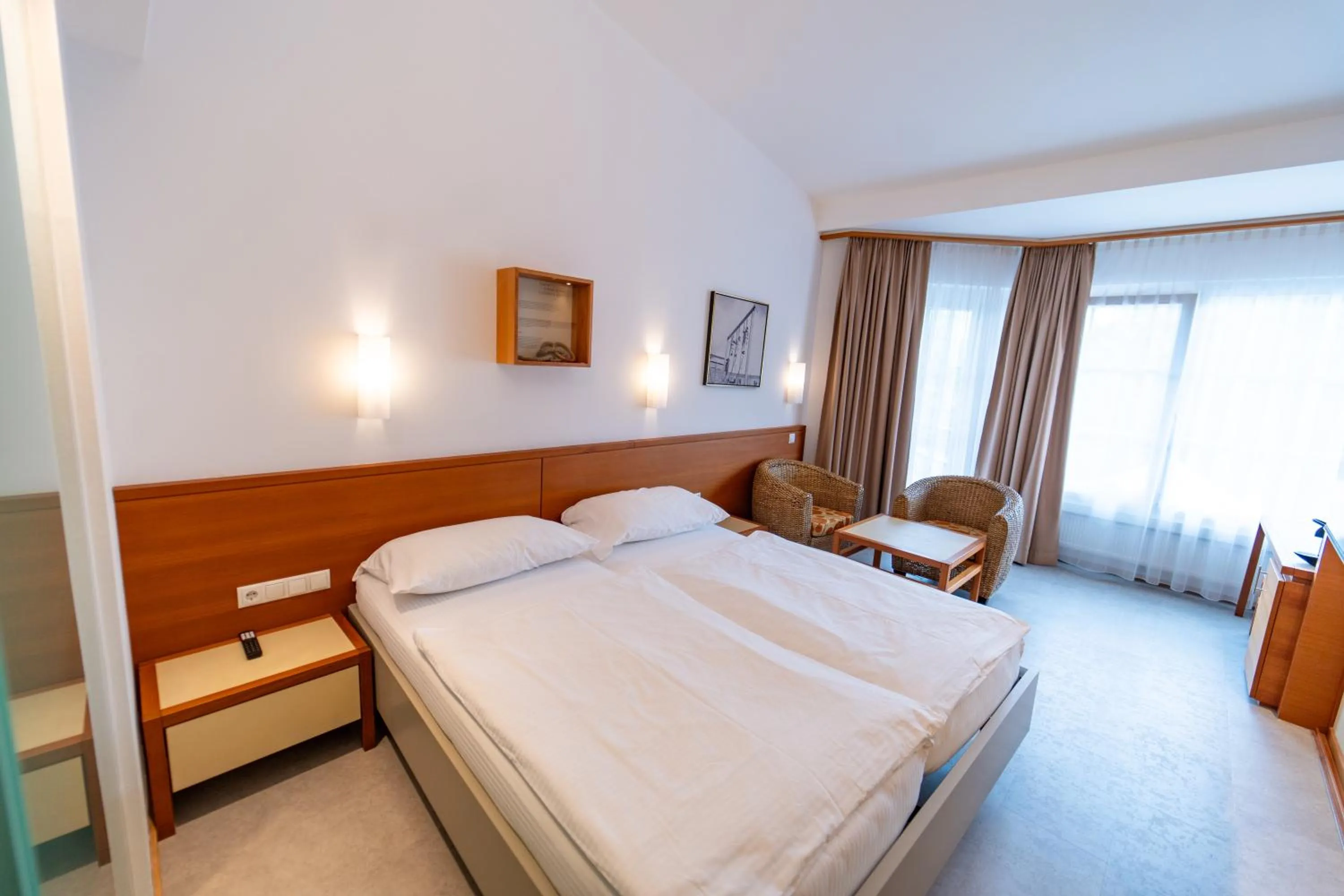 Photo of the whole room, Bed in Sporthotel Igls