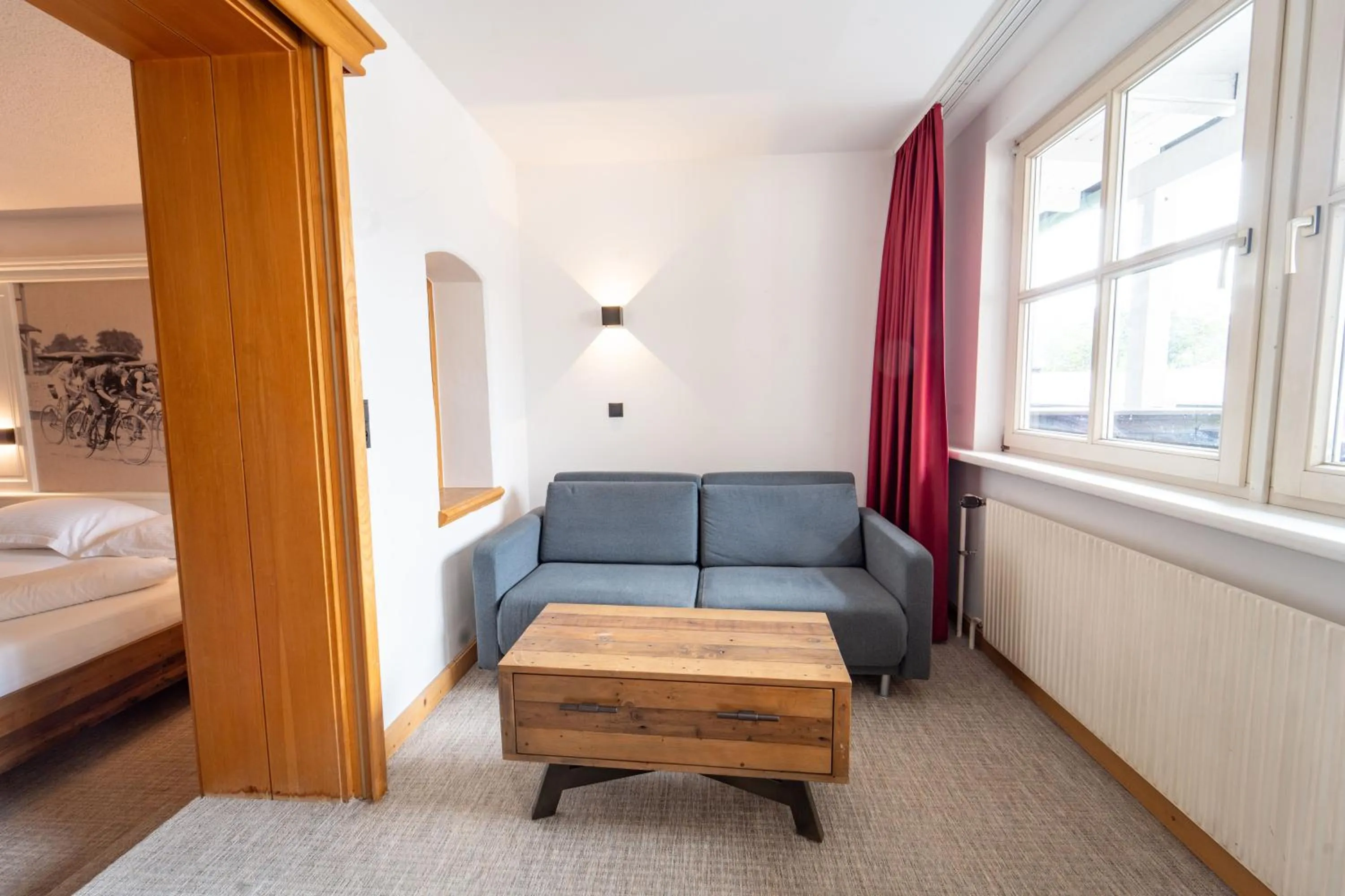 Living room, Bed in Sporthotel Igls