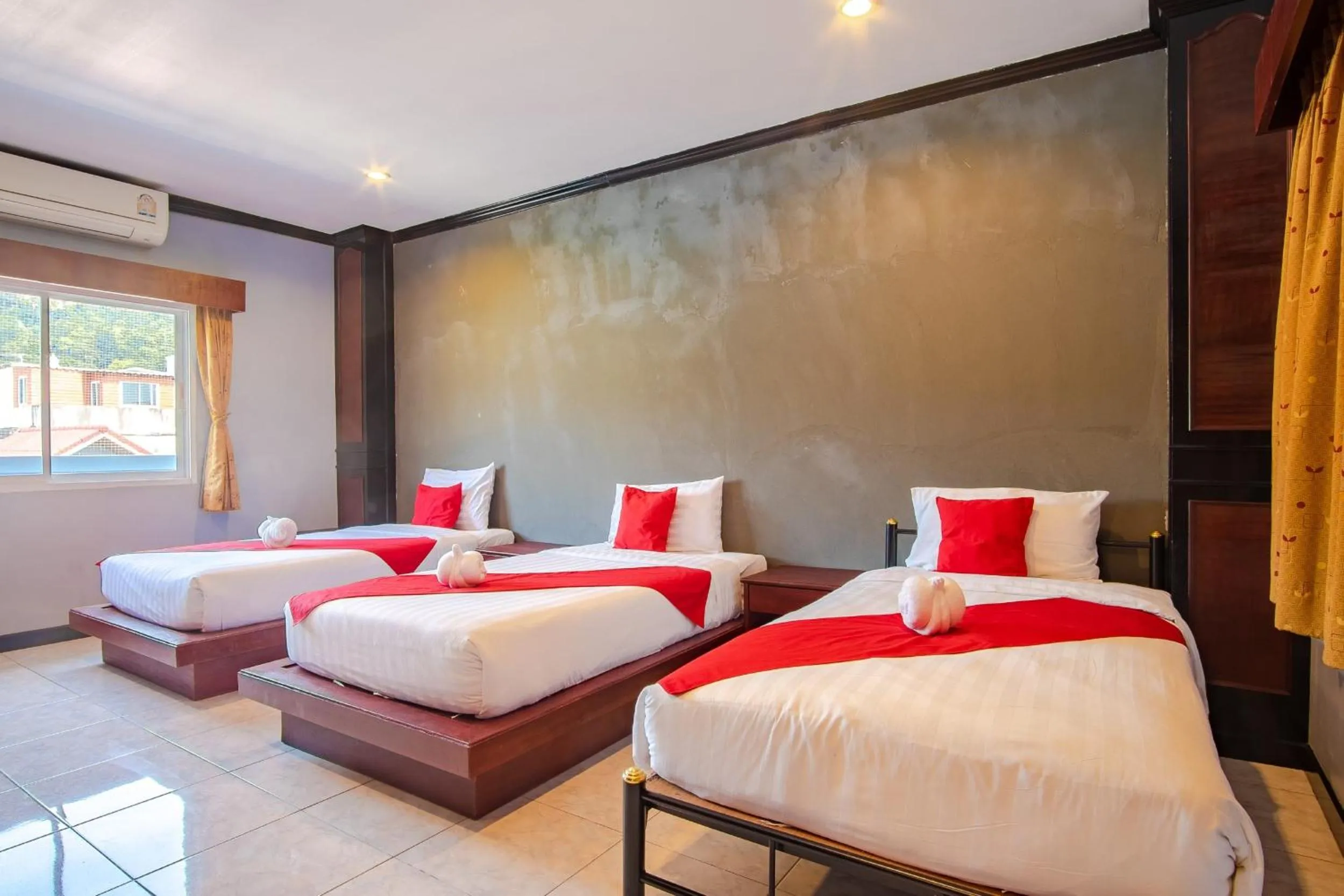 Bed in Art Mansion Patong Hotel