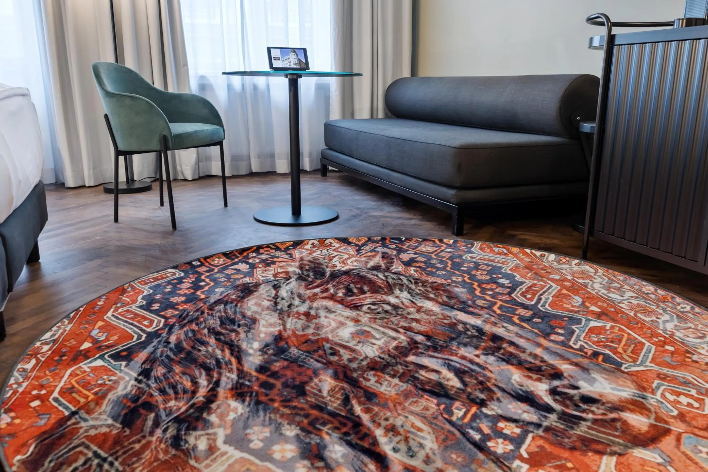 Seating area in Hotel Astoria Vienna, Curio Collection by Hilton