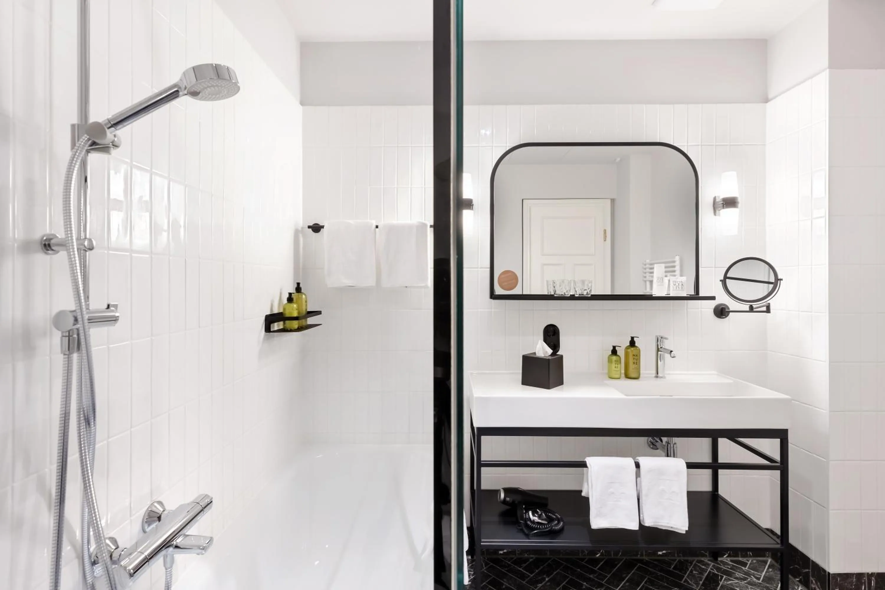 Bathroom in Hotel Astoria Vienna, Curio Collection by Hilton