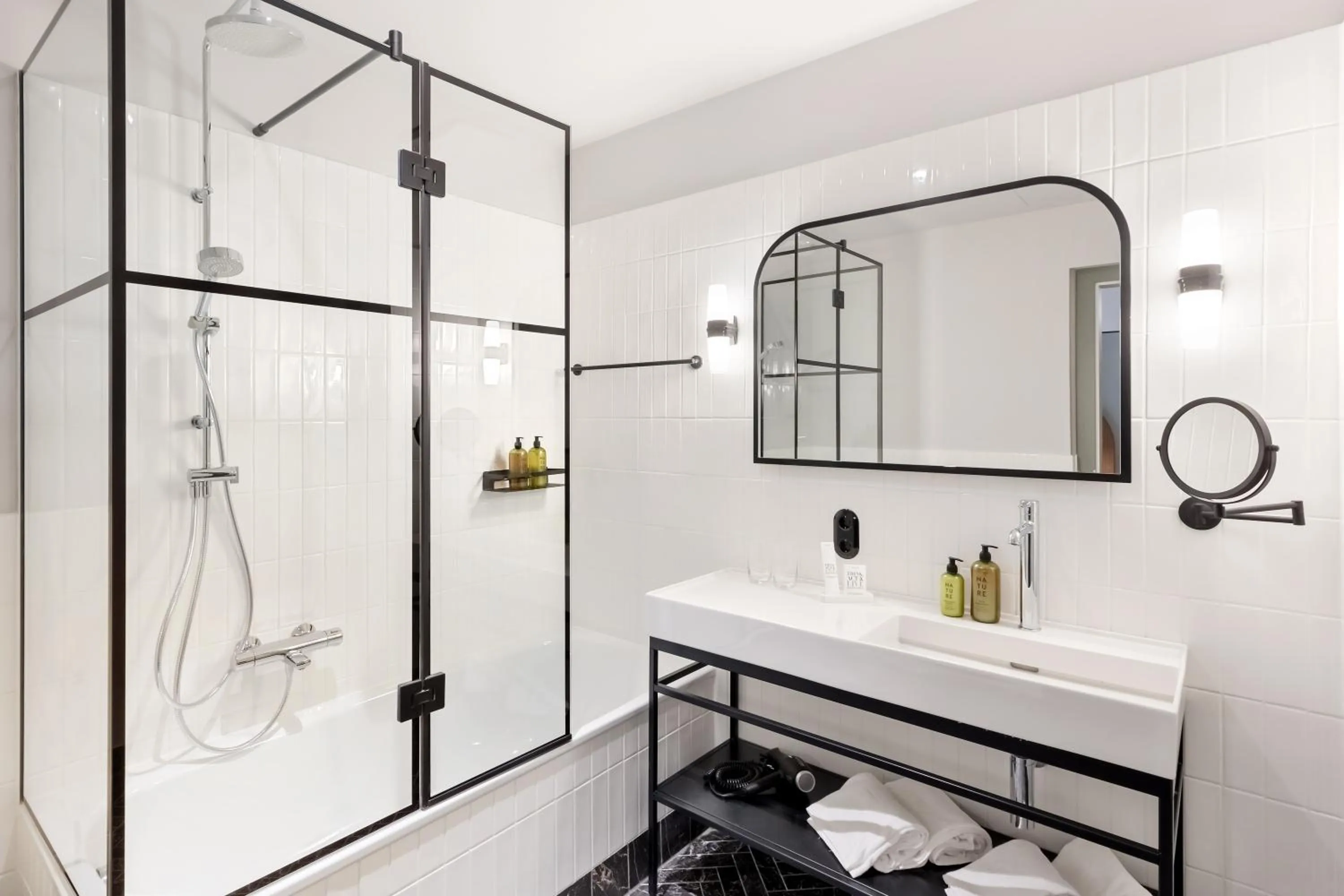 Bathroom in Hotel Astoria Vienna, Curio Collection by Hilton