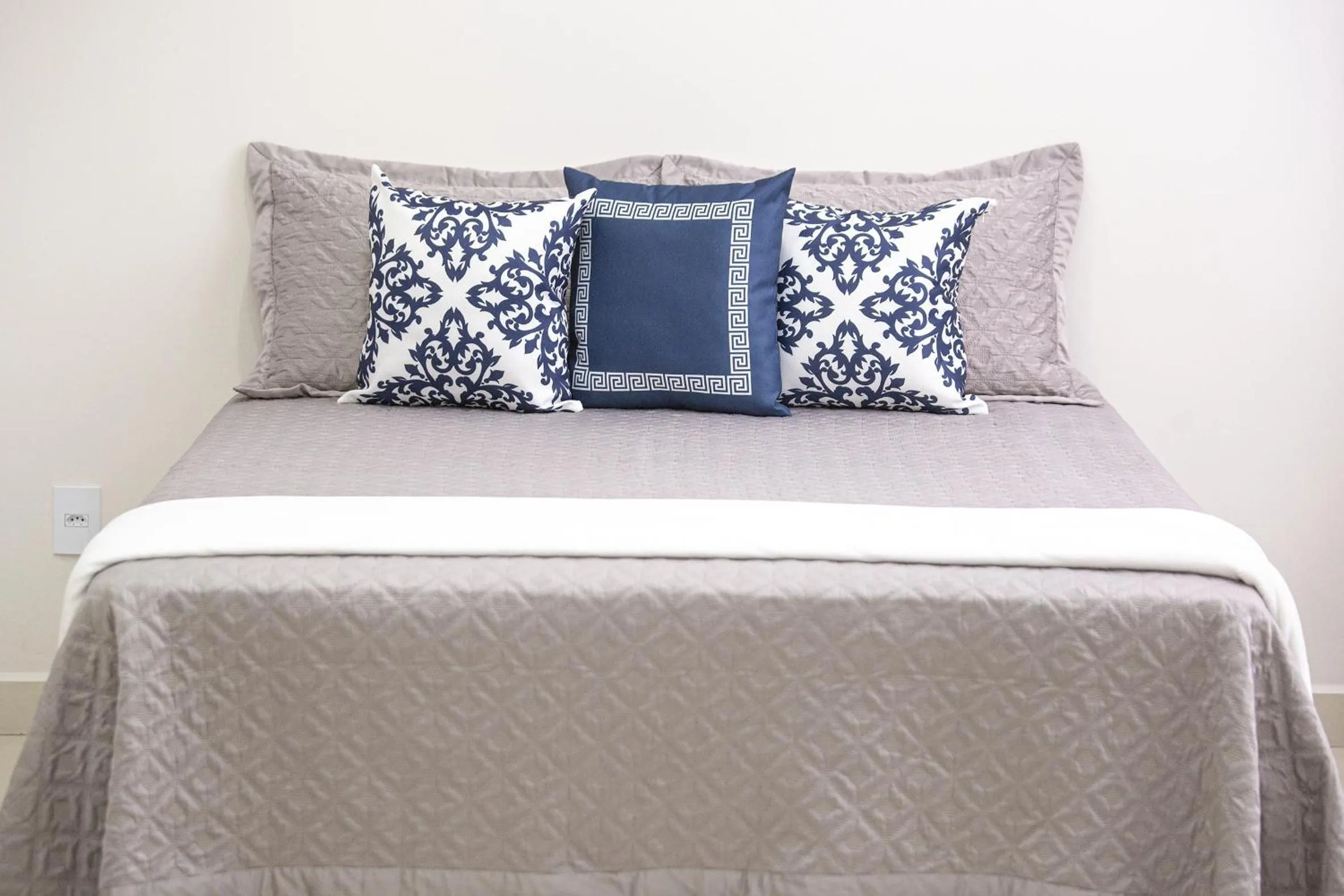 Bed in Hotel Amsterdam Suítes