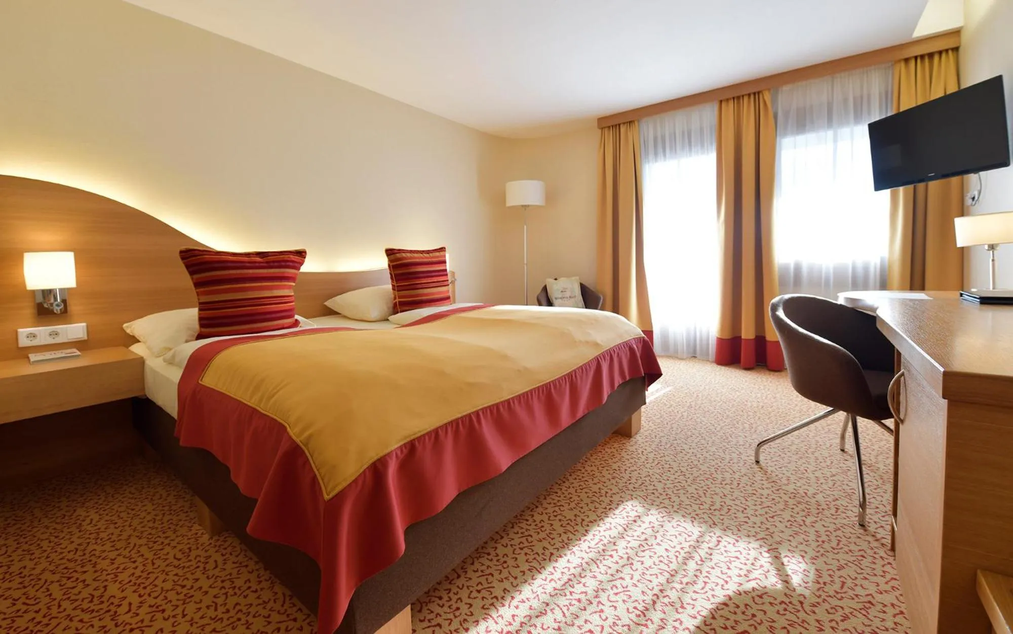 Photo of the whole room, Bed in Seehotel Rust