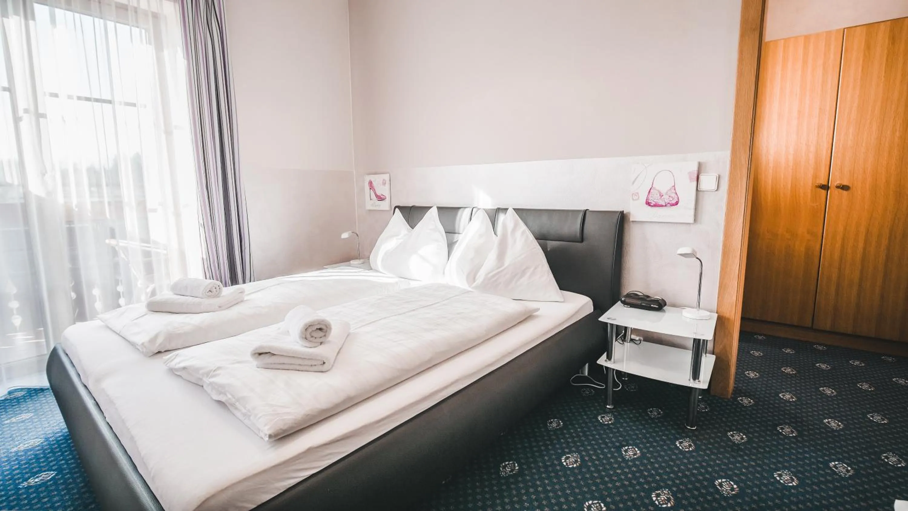 Bedroom, Bed in Hotel Kärntnerhof Velden by S4Y