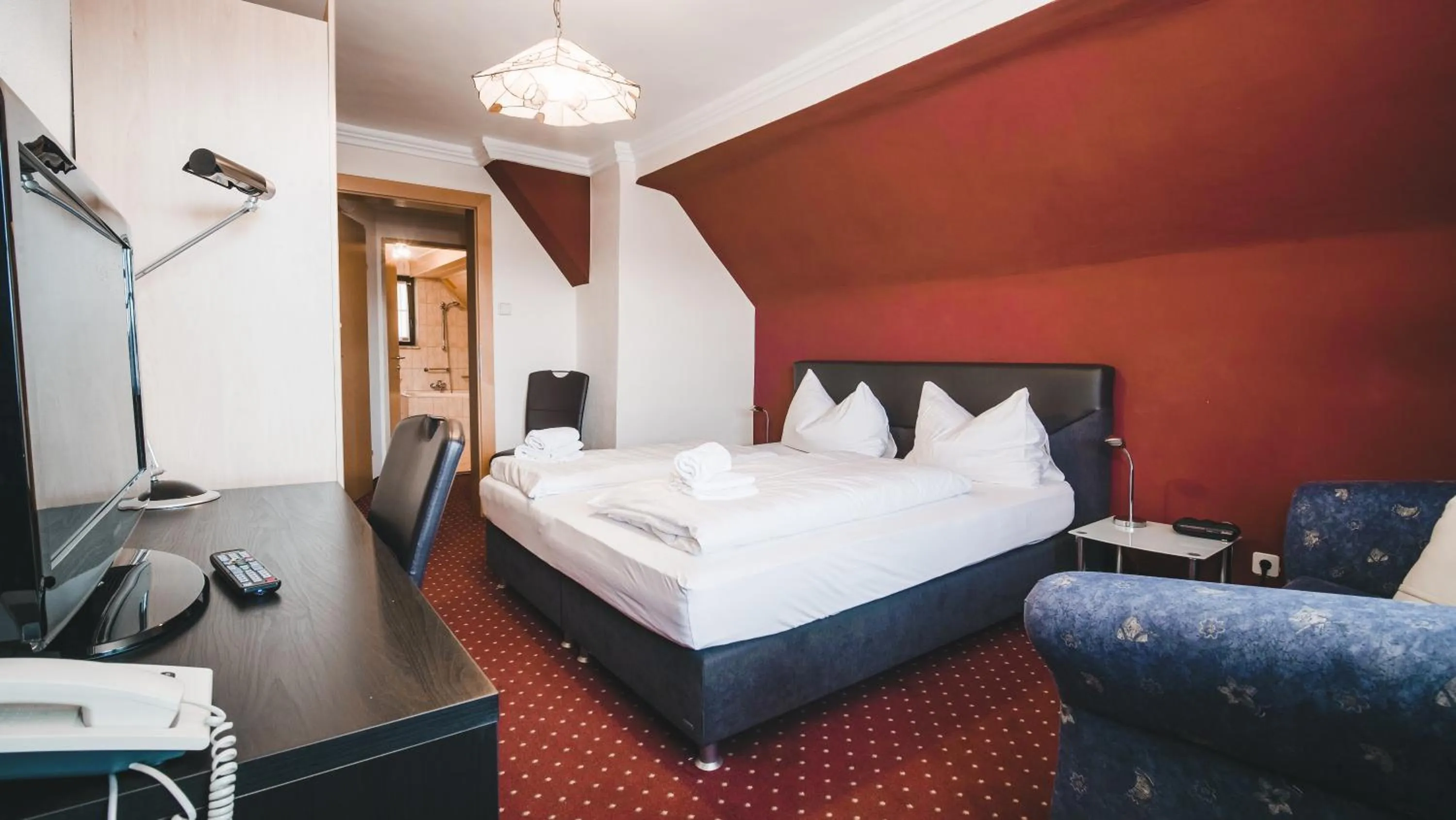 Bedroom, Bed in Hotel Kärntnerhof Velden by S4Y