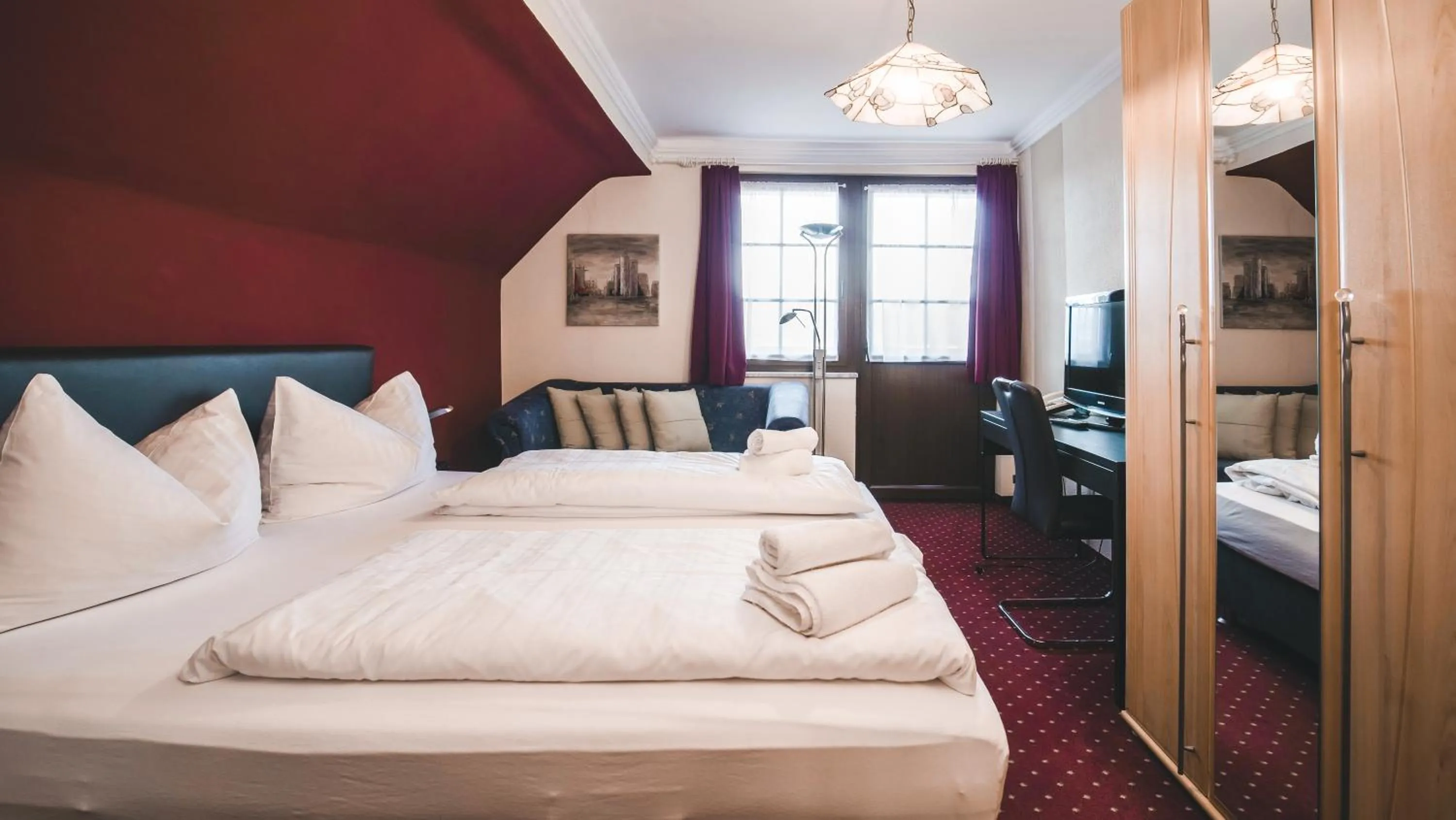 Bedroom, Bed in Hotel Kärntnerhof Velden by S4Y