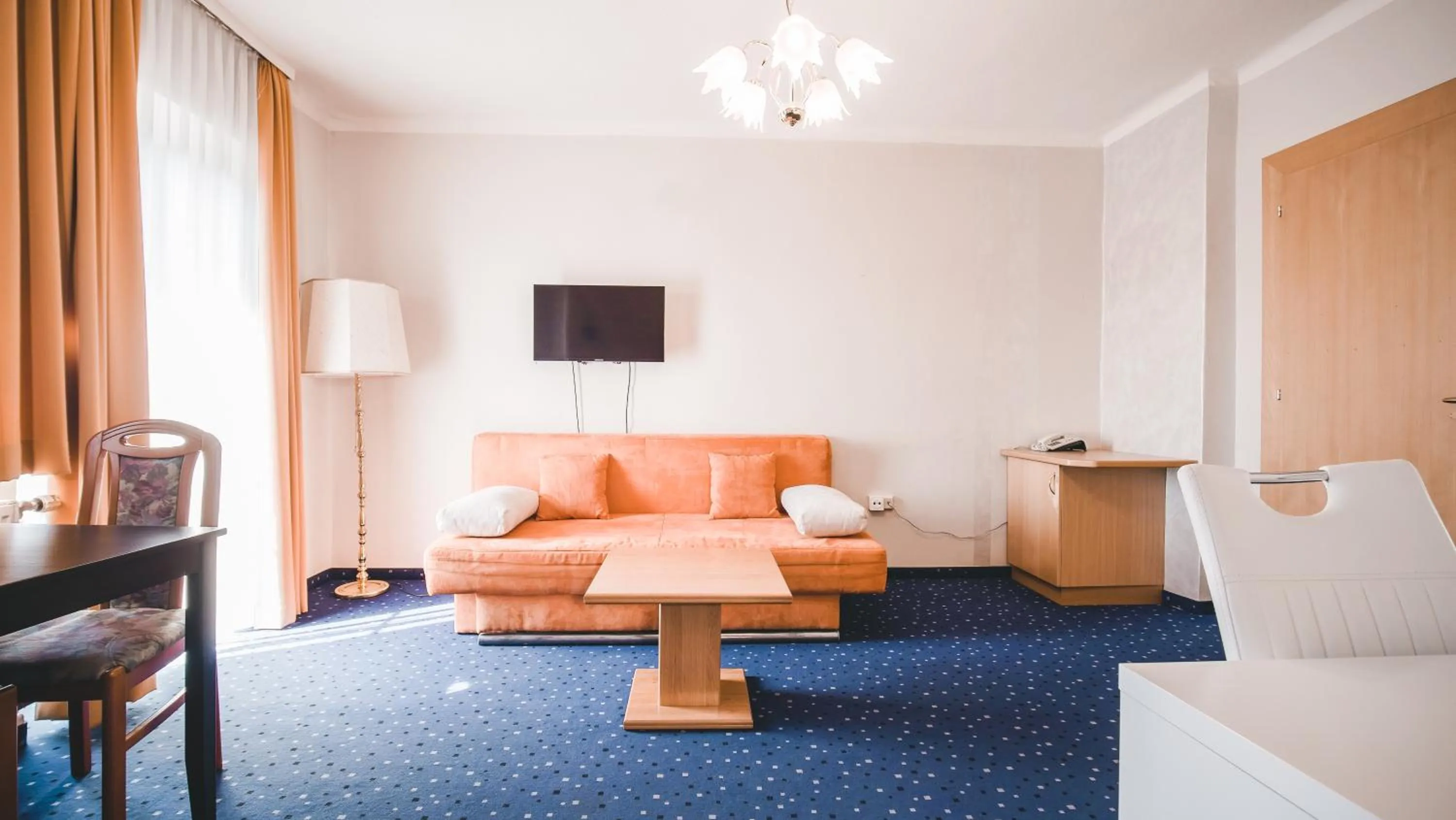 Seating area, Bed in Hotel Kärntnerhof Velden by S4Y