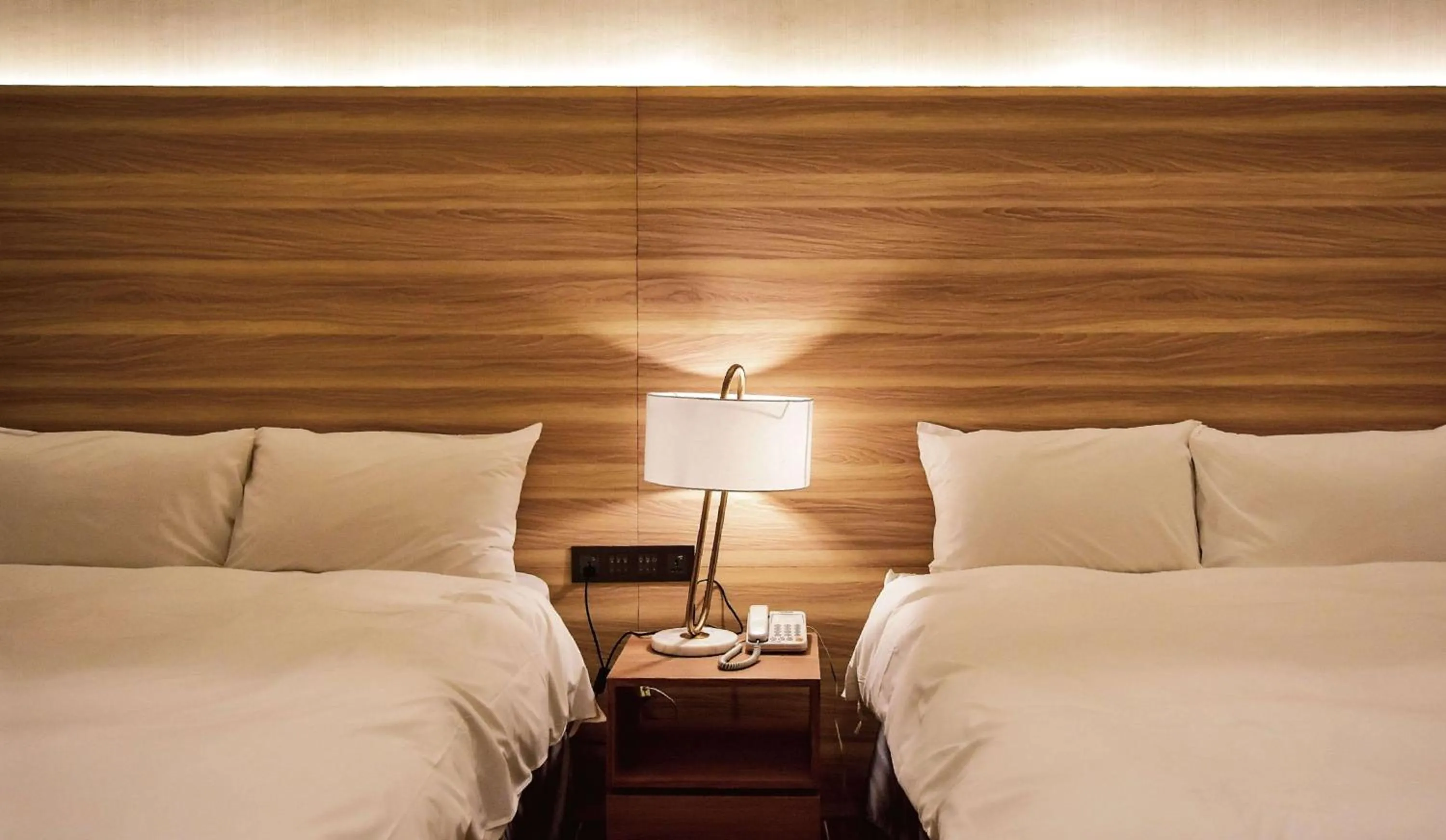 Bed in Muen Yuan Dong Hot Spring Hotel