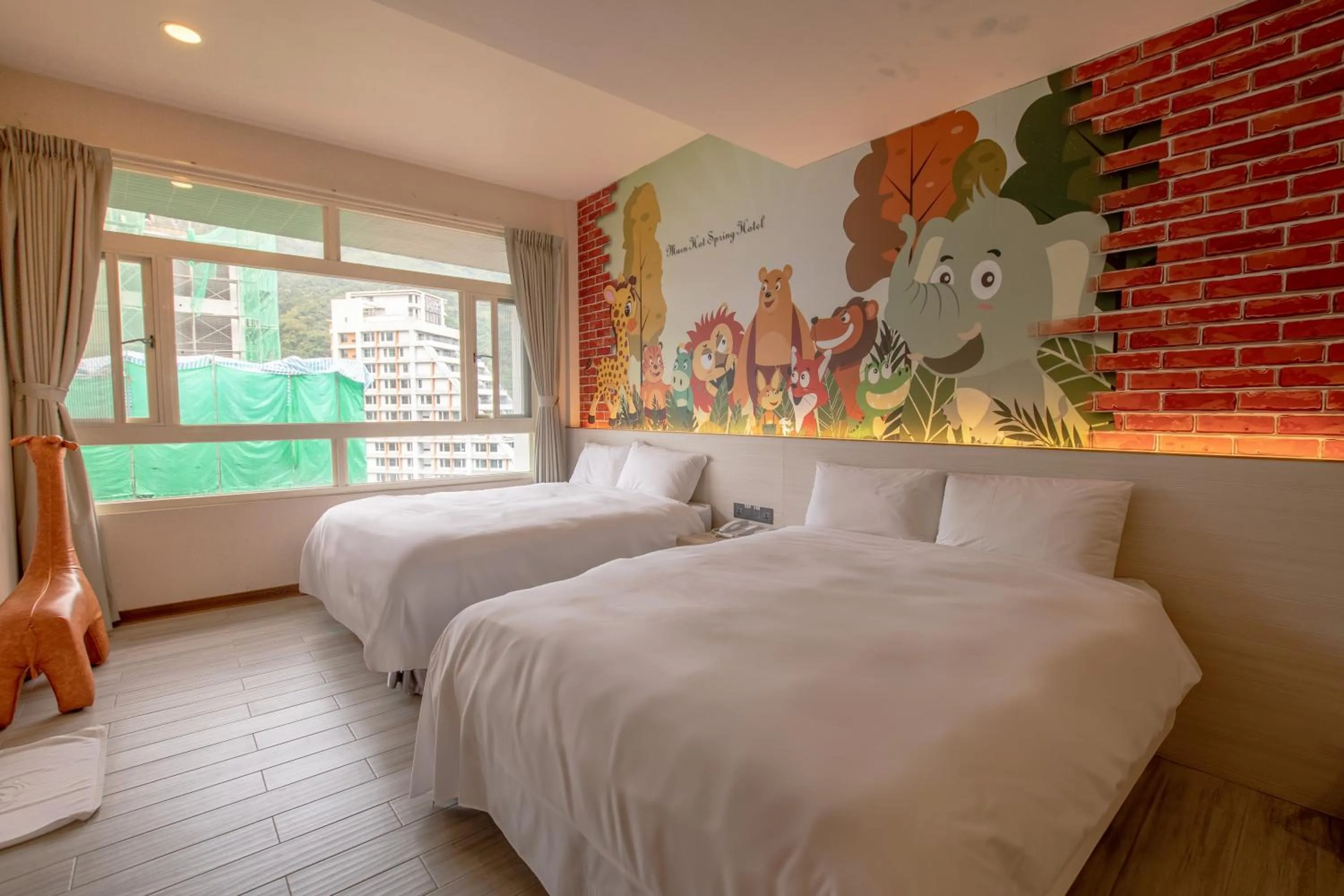 Bed in Muen Yuan Dong Hot Spring Hotel