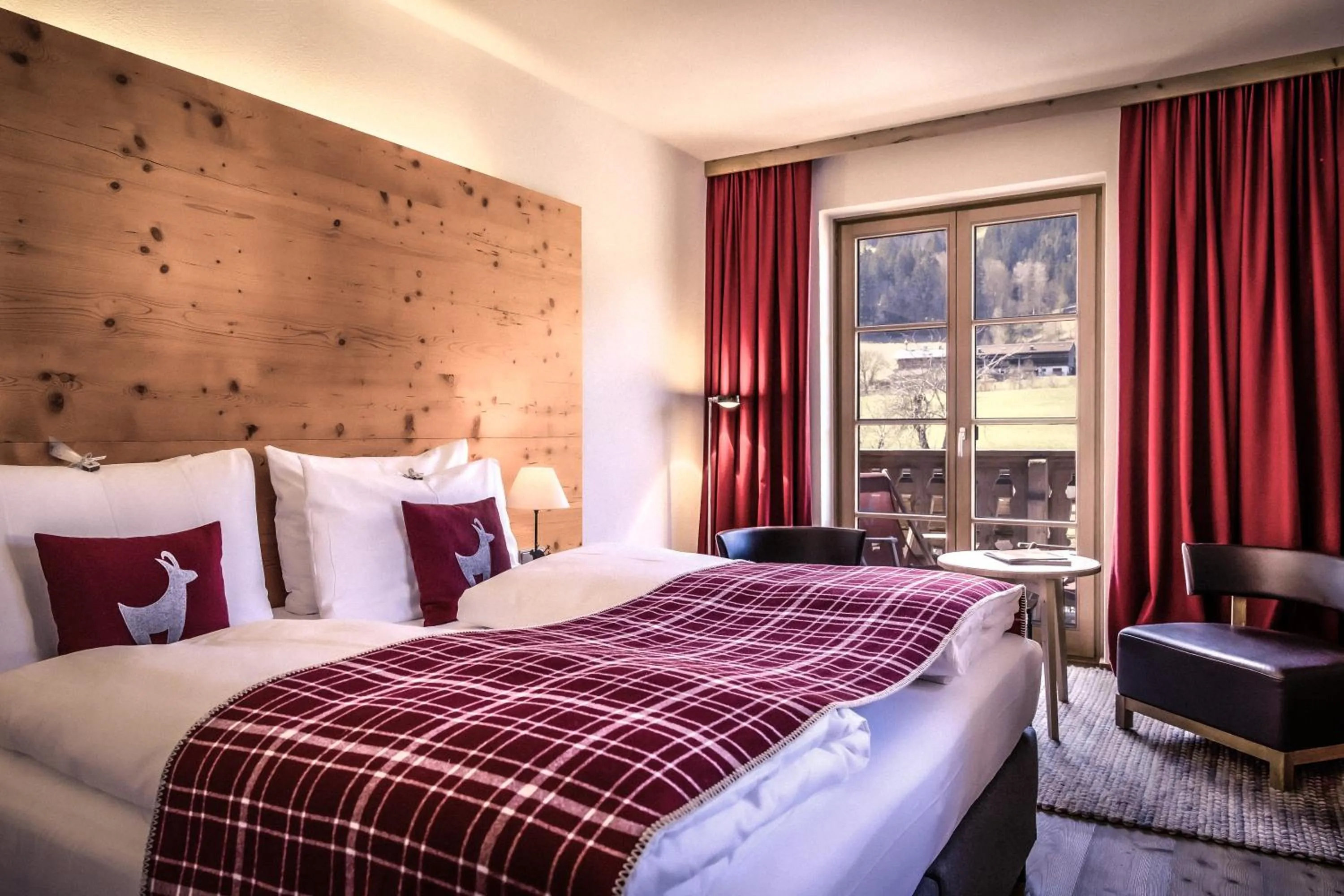 Bedroom, Bed in Kitzhof Mountain Design Resort, 4 Sterne Superior