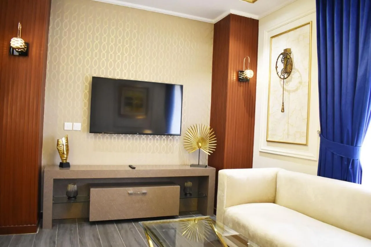 Communal lounge/ TV room in Faletti's Grand Hotel Multan