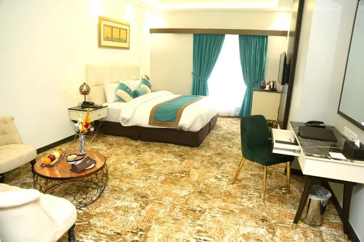 Photo of the whole room, Bed in Faletti's Grand Hotel Multan
