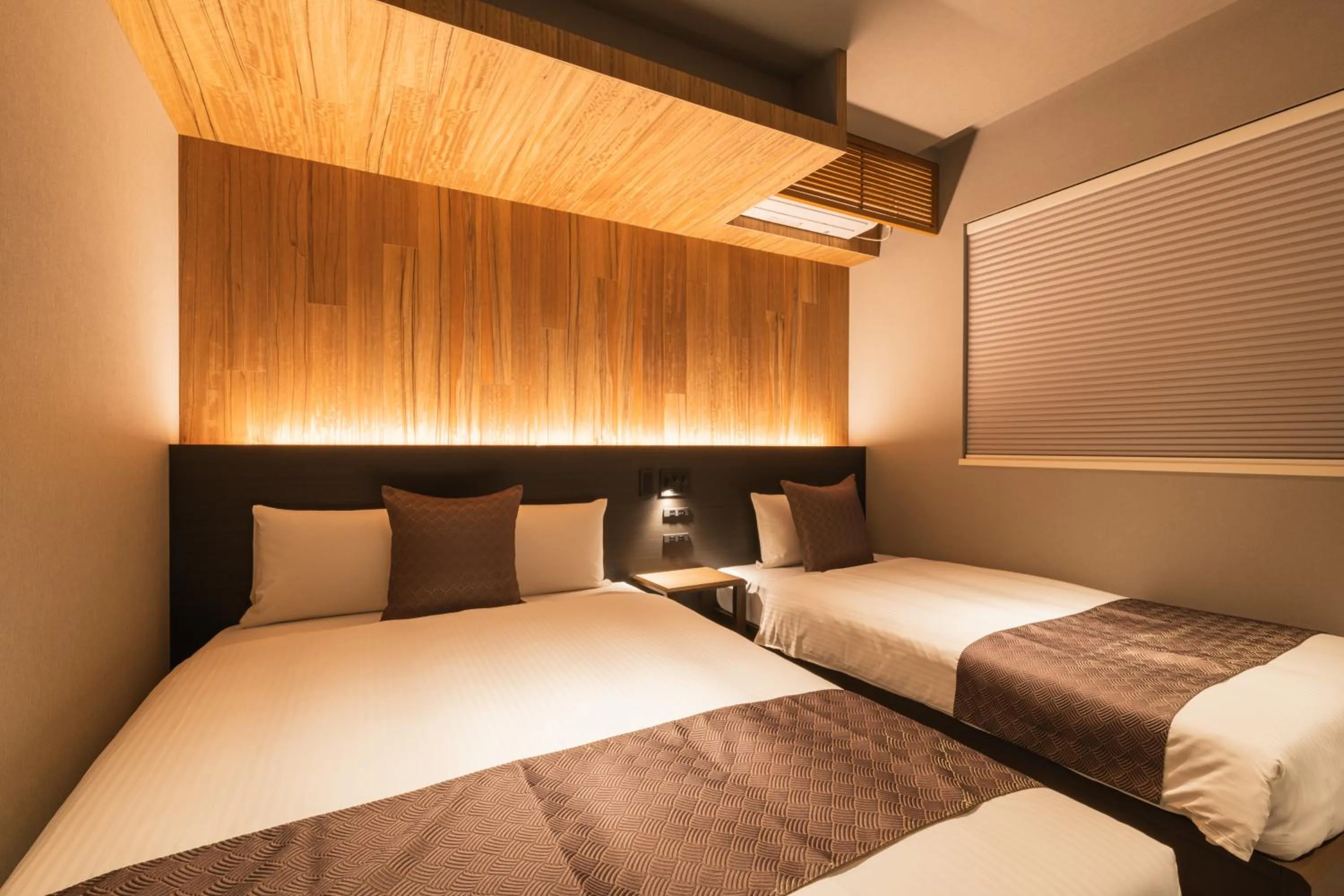 Bed in GRAND BASE Kagoshima Chuo