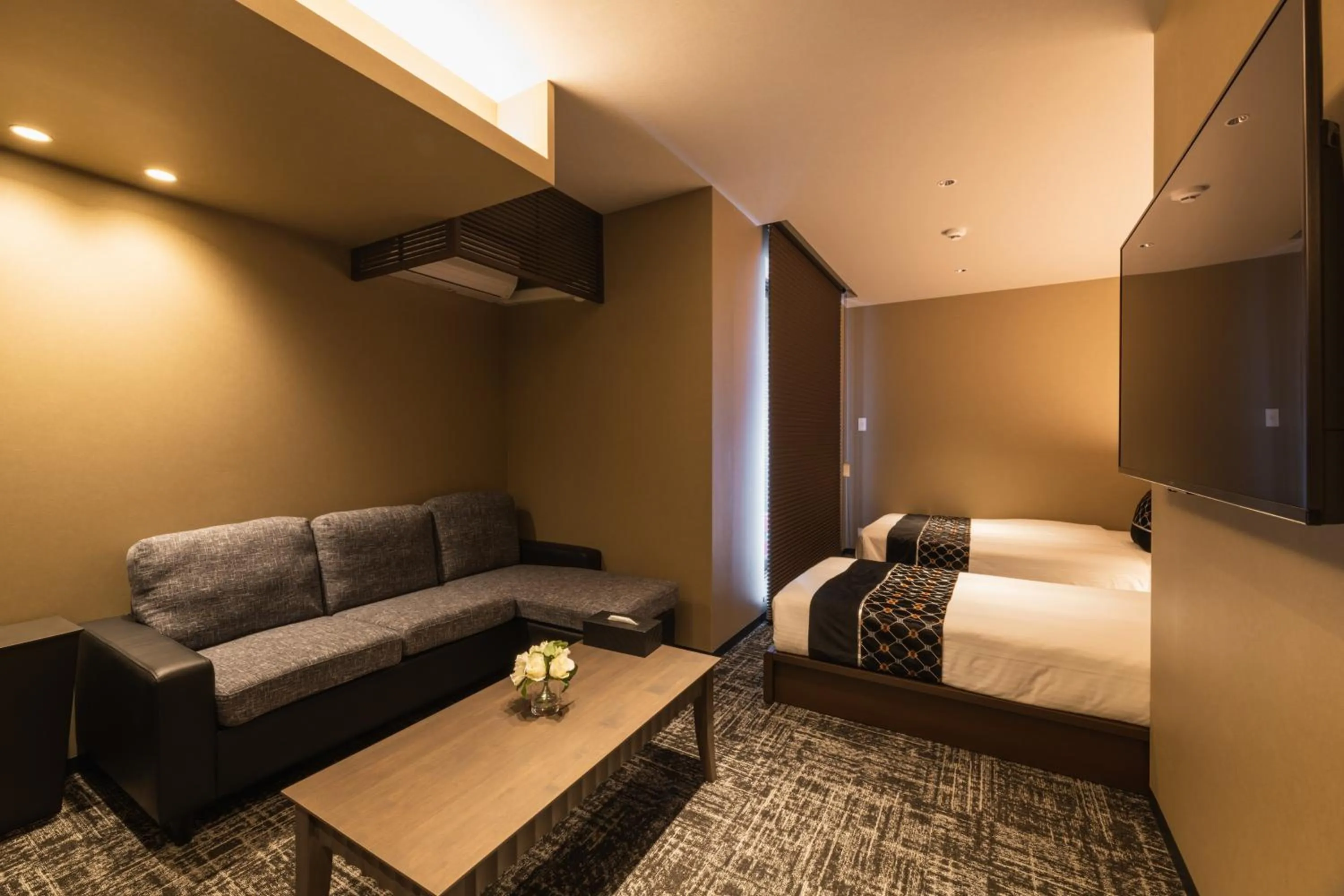 Photo of the whole room, Bed in GRAND BASE Kagoshima Chuo