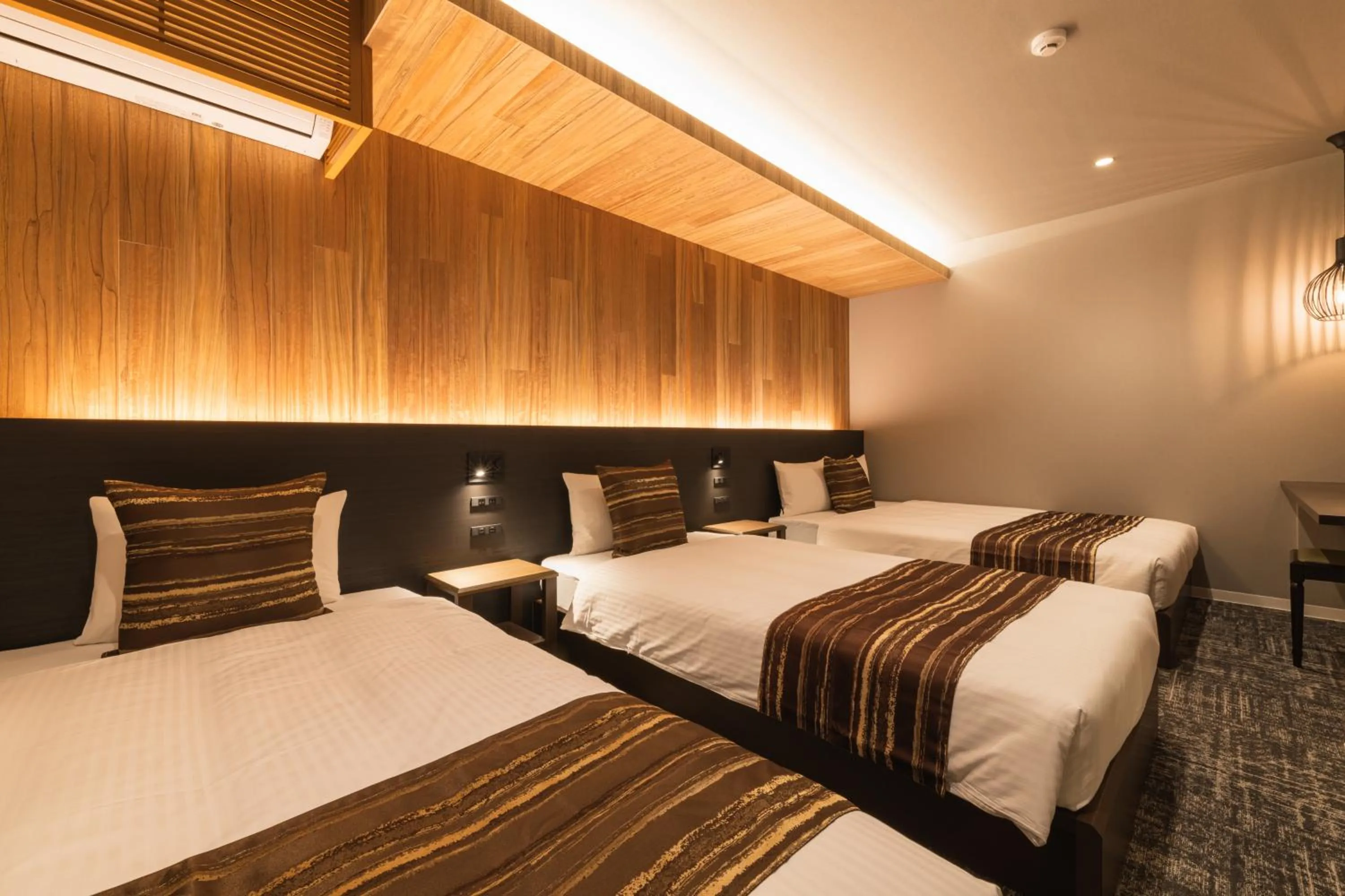 Bed in GRAND BASE Kagoshima Chuo