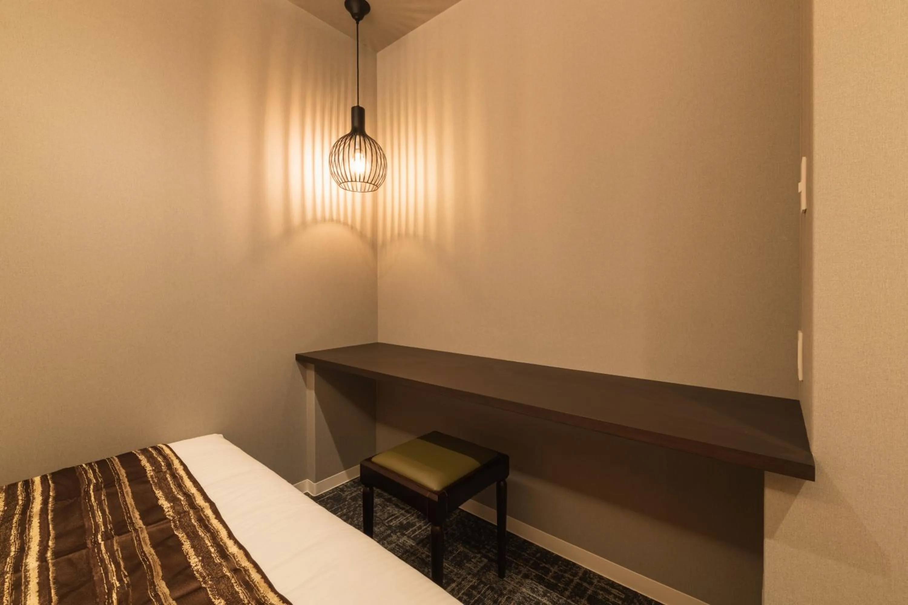 Photo of the whole room, Bed in GRAND BASE Kagoshima Chuo